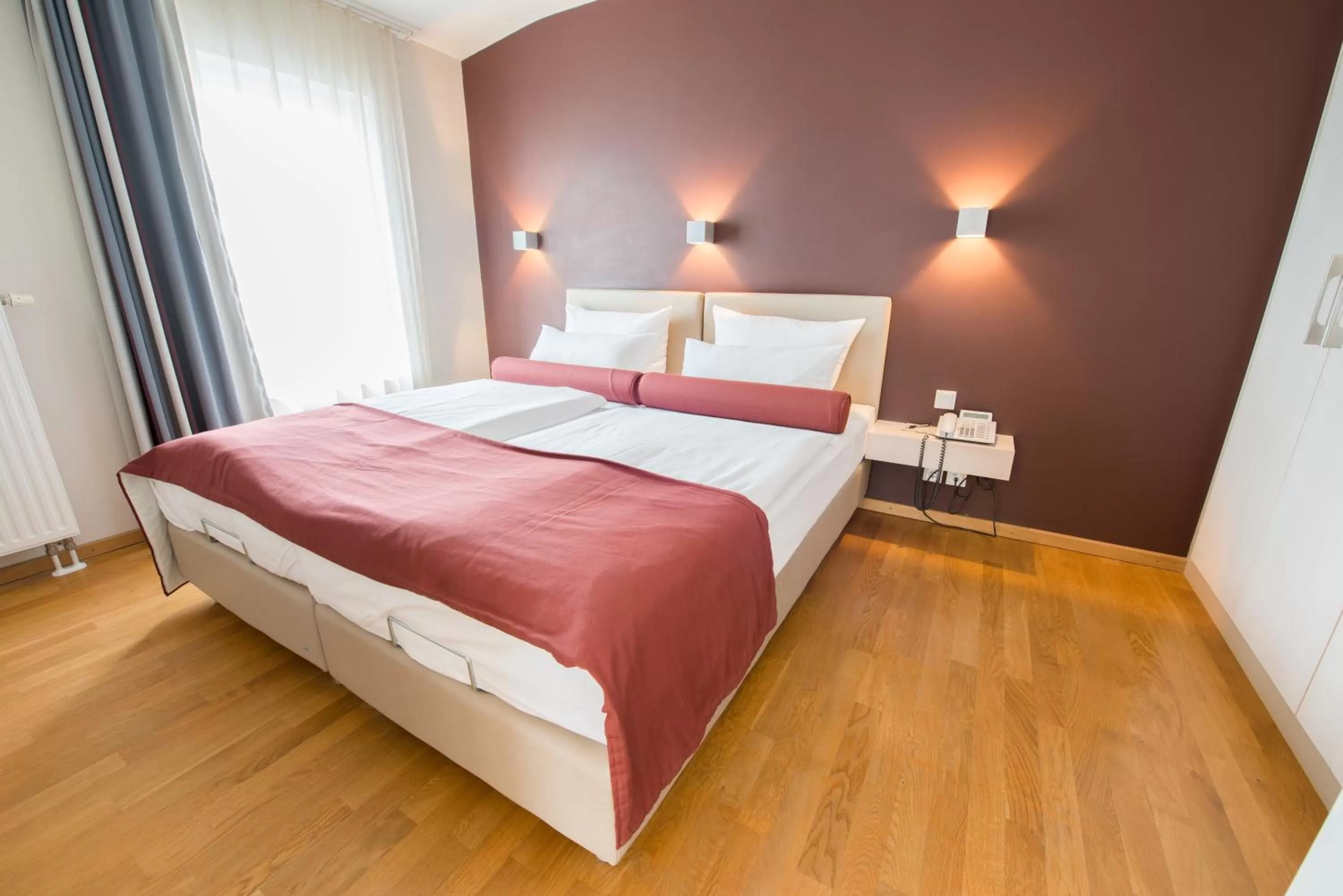 Bedroom, Bed in Nymphe Strandhotel & Apartments