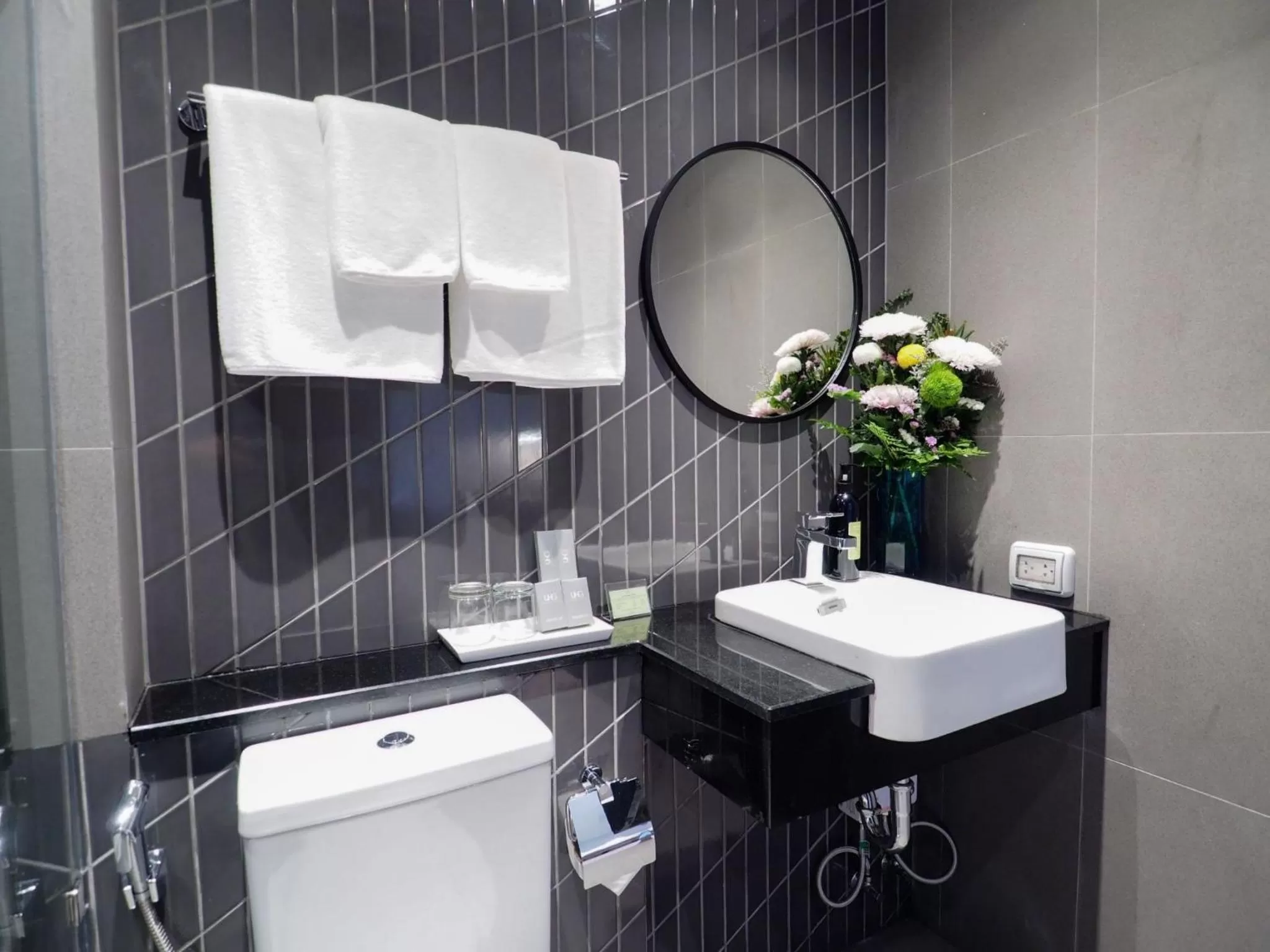 Bathroom in Asoke Residence Sukhumvit by UHG