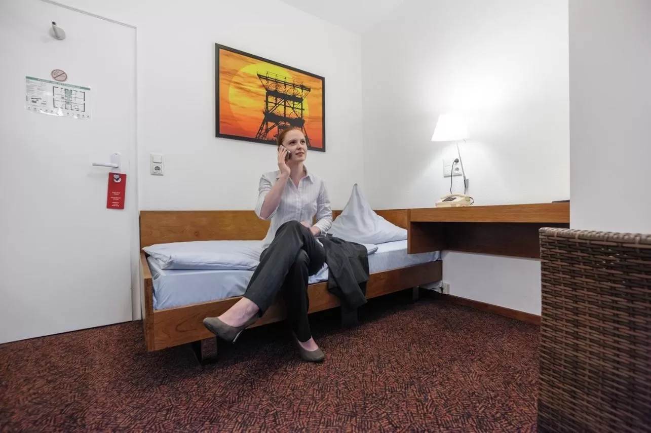 Photo of the whole room, Bed in Hotel Böll Essen