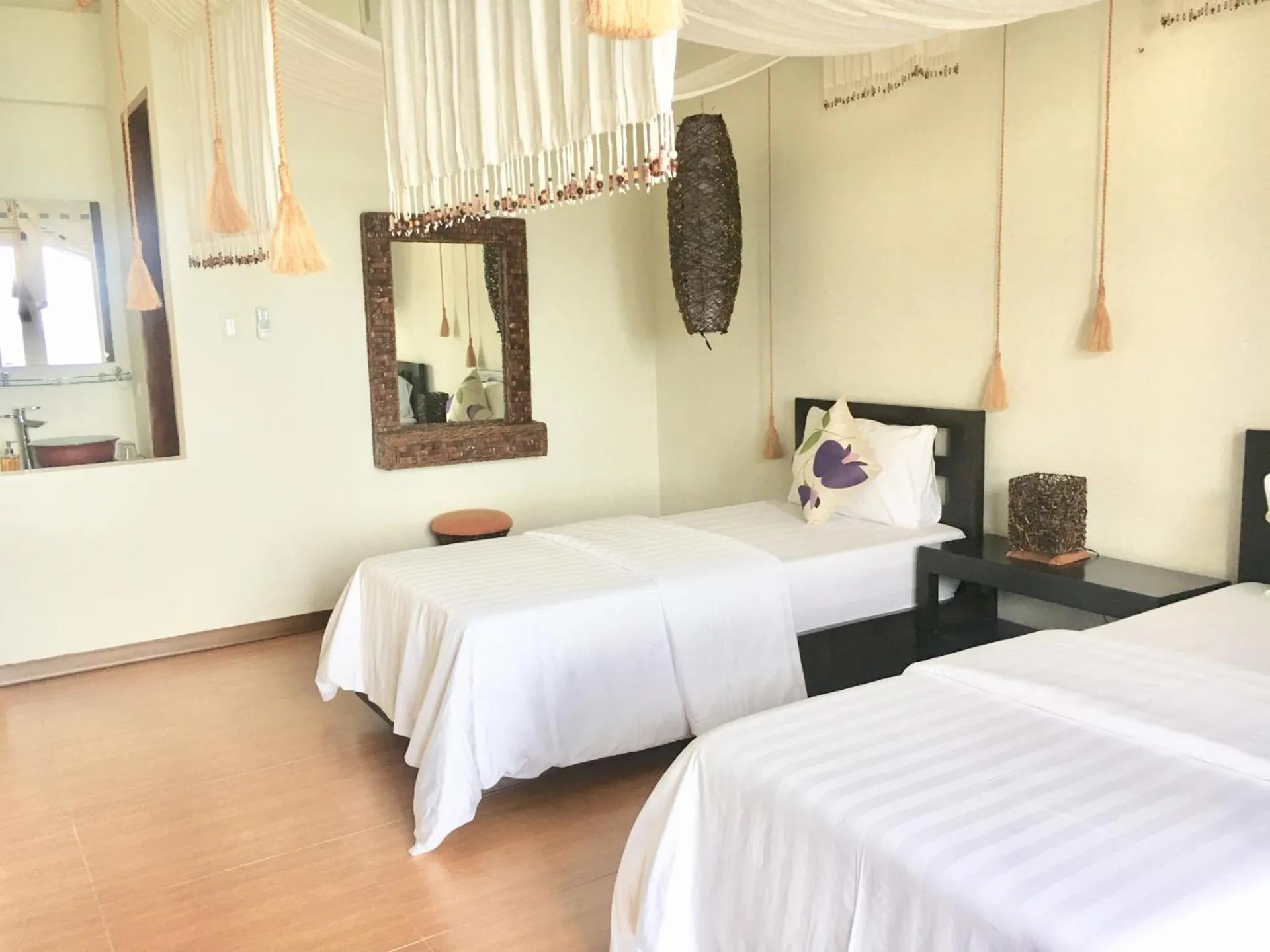 Photo of the whole room, Bed in Sunset At Aninuan Beach Resort