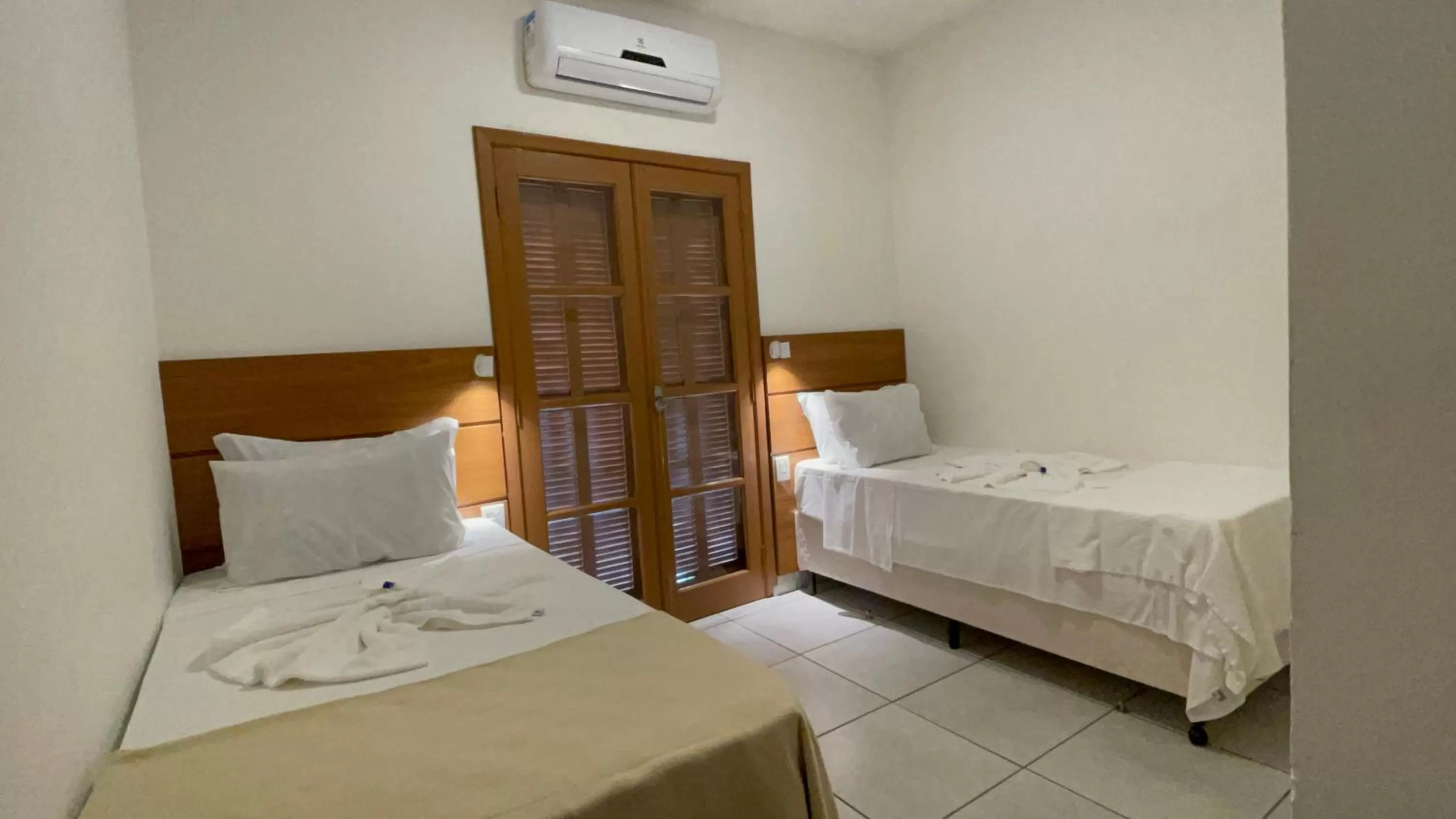 Bedroom, Bed in Pousada Ilha Vitoria