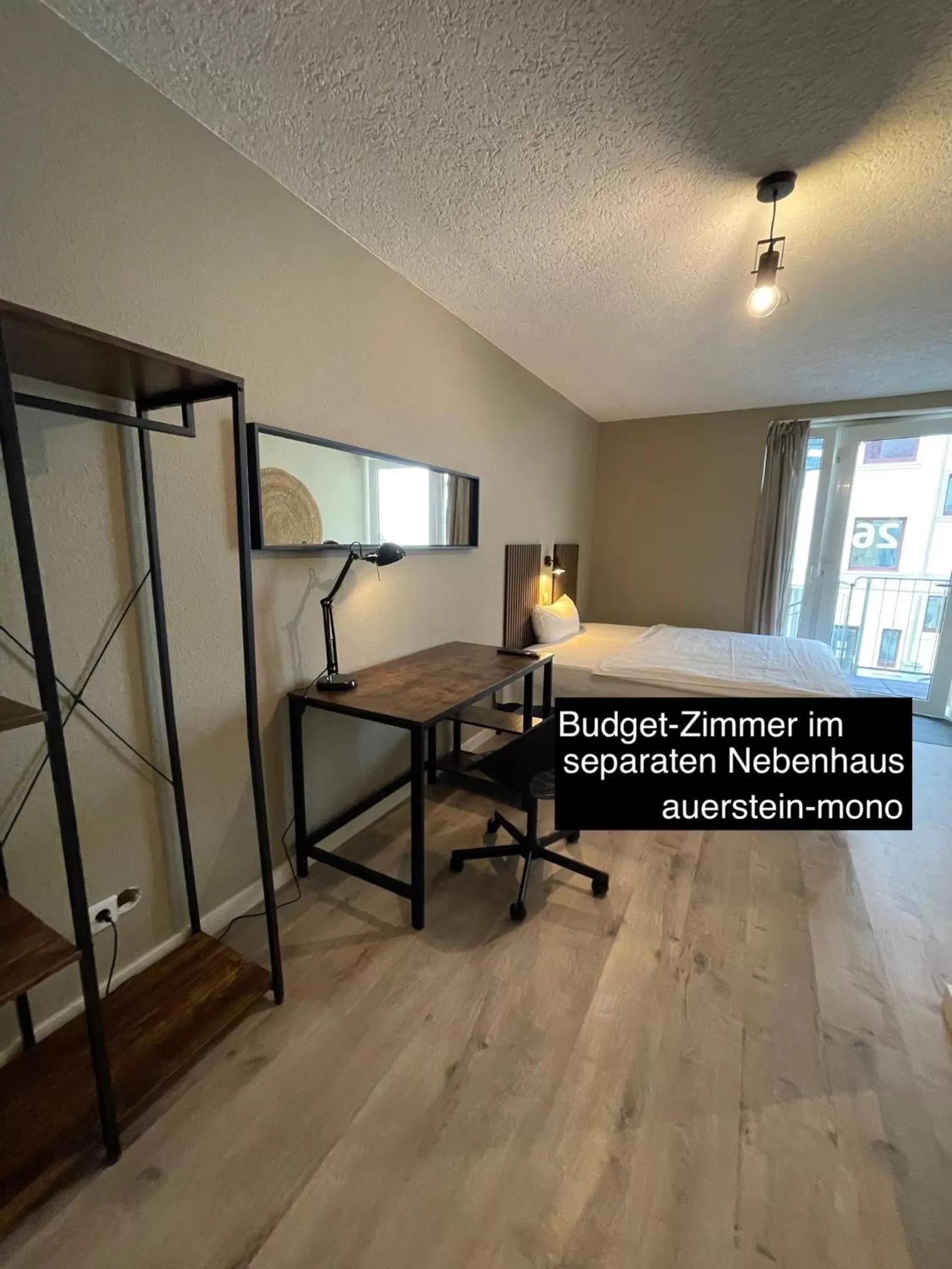 Bed in AUERSTEIN-Hotels auerstein & auerstein-mono