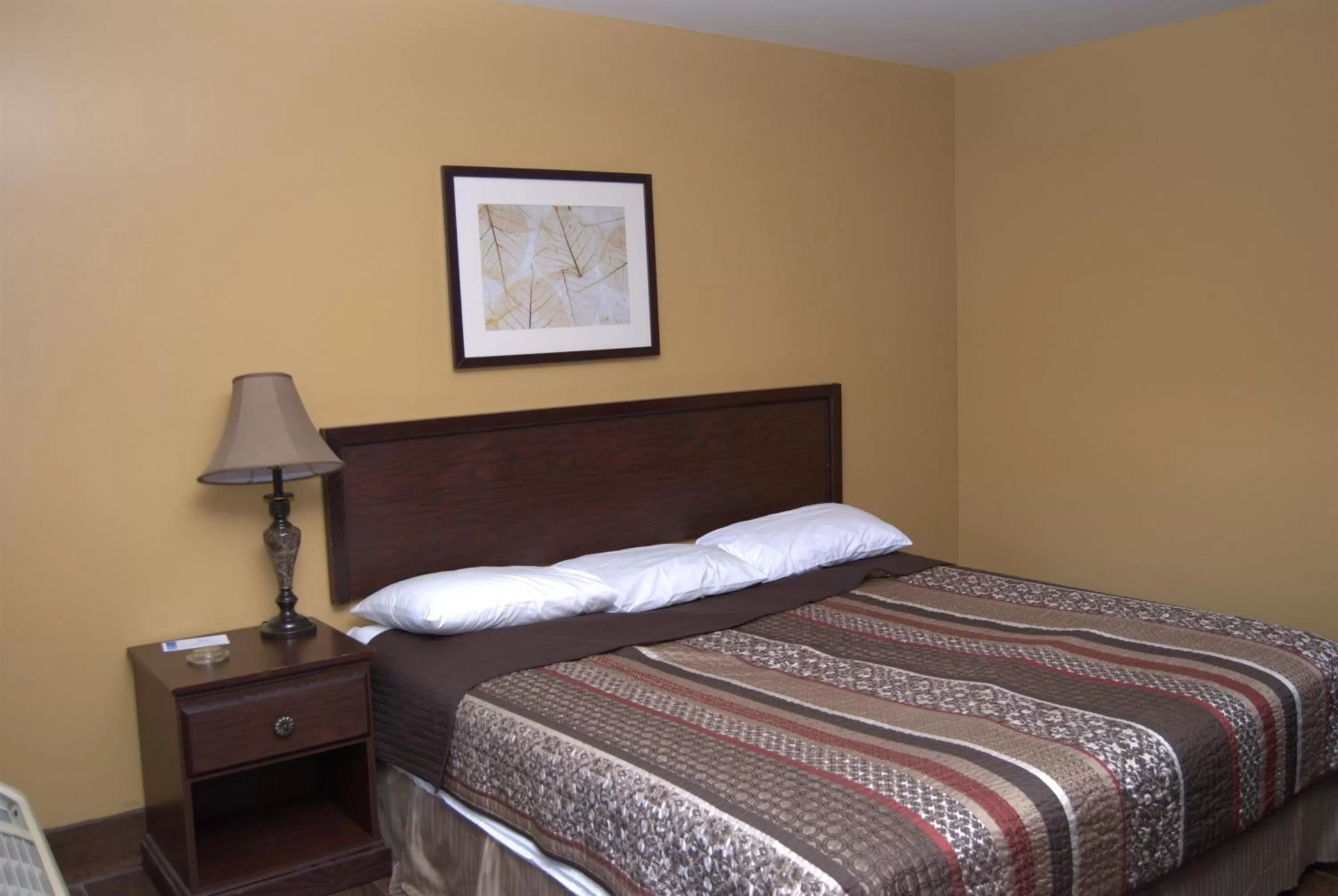 Bed in Commodore Resort