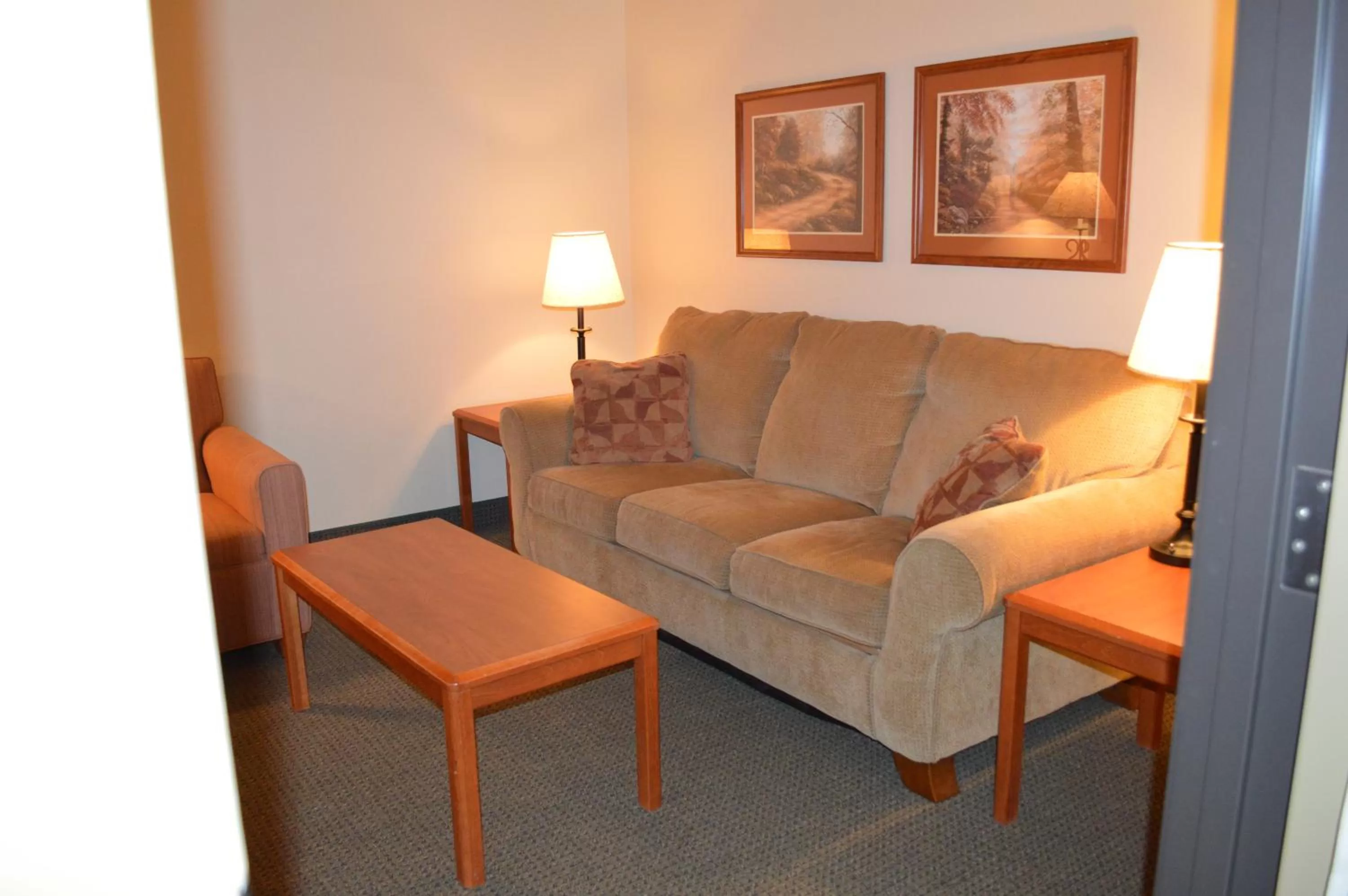 Seating area in AmericInn by Wyndham Havre