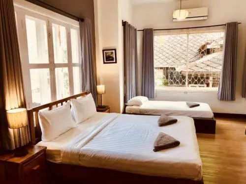 Bed in Prantara Heritage Suites