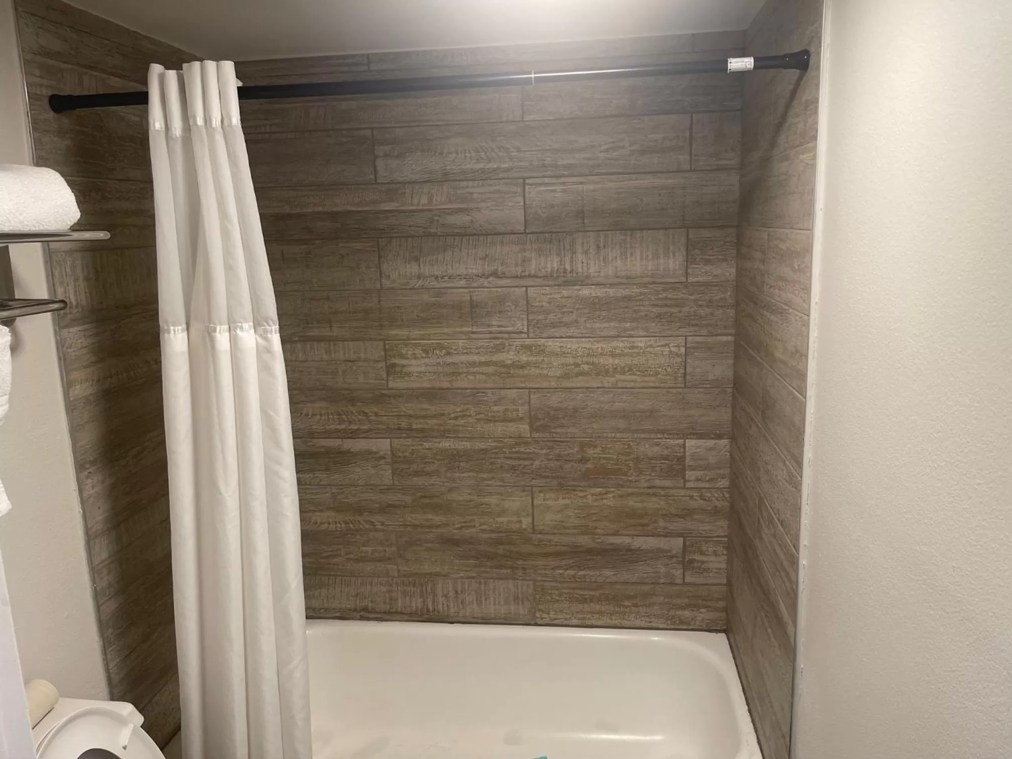 Shower in Quality Inn & Suites Orlando East - UCF Area
