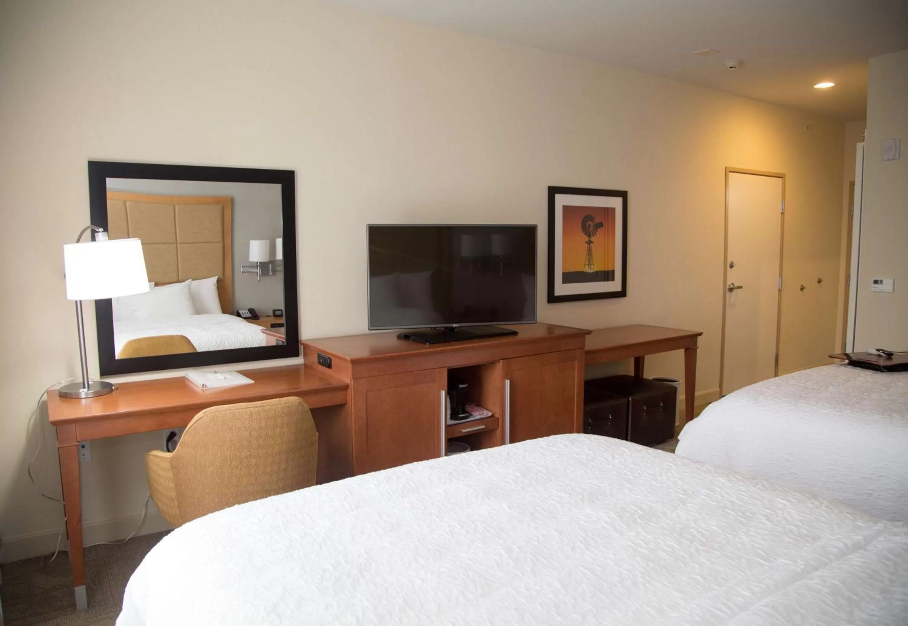 Bed in Hampton Inn and Suites by Hilton McKinney