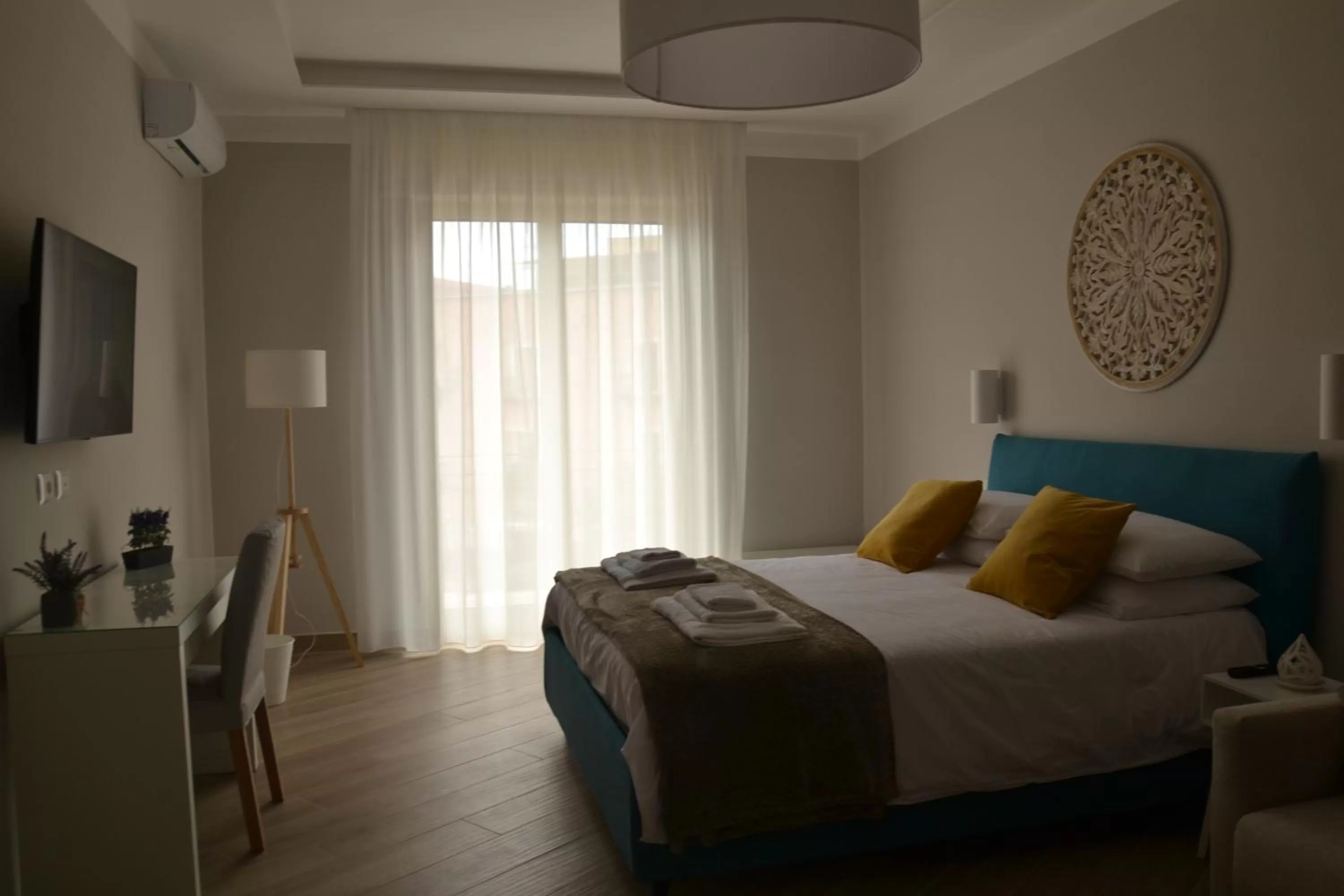 Bed in Luna Nuova Suites