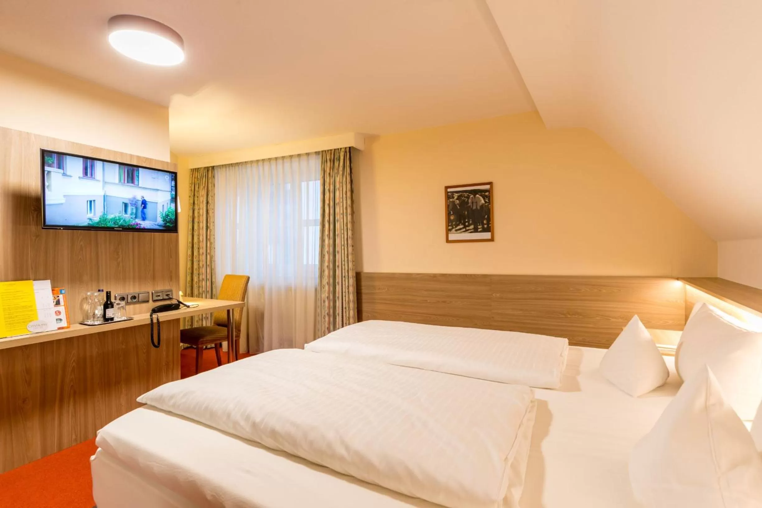 Photo of the whole room, Bed in CityHotel Kempten