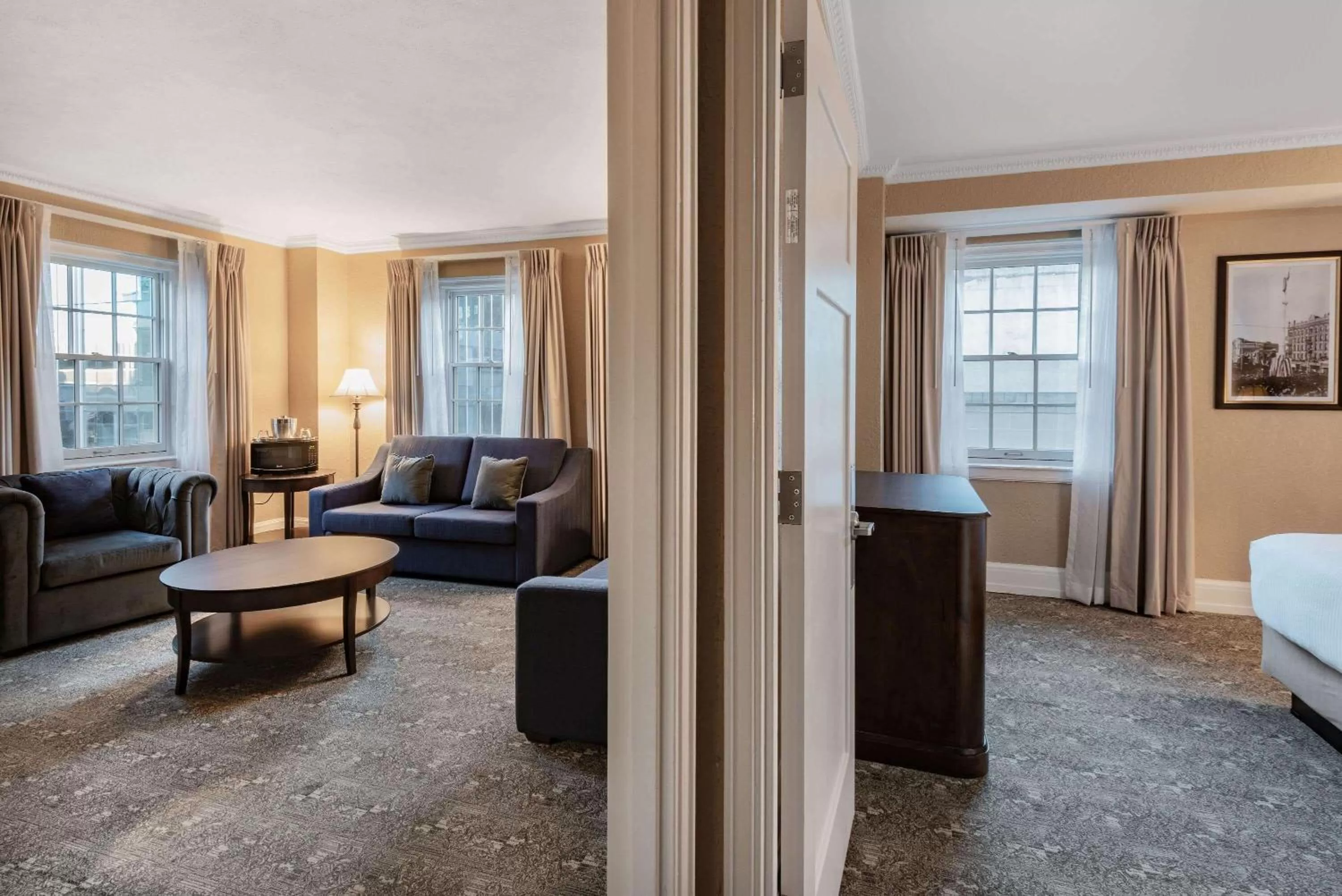 Living room, Bed in The Americus Hotel, Trademark Collection by Wyndham