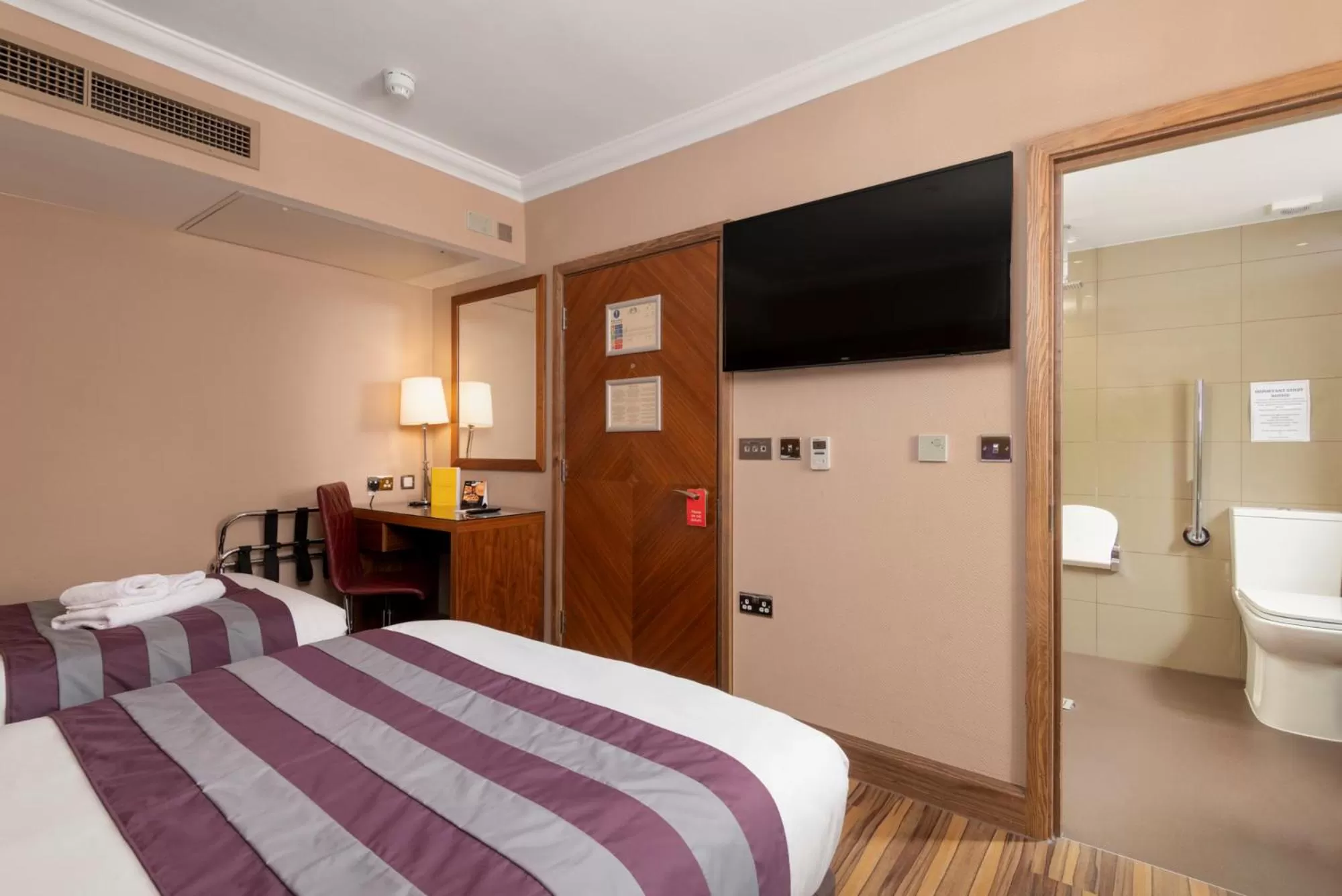 Bed in Donnington Manor Hotel