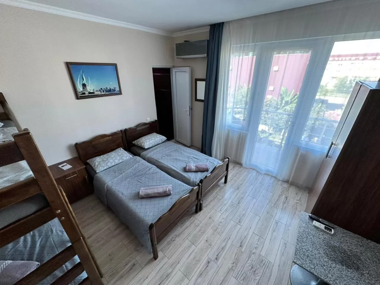 Photo of the whole room, Bed in National+