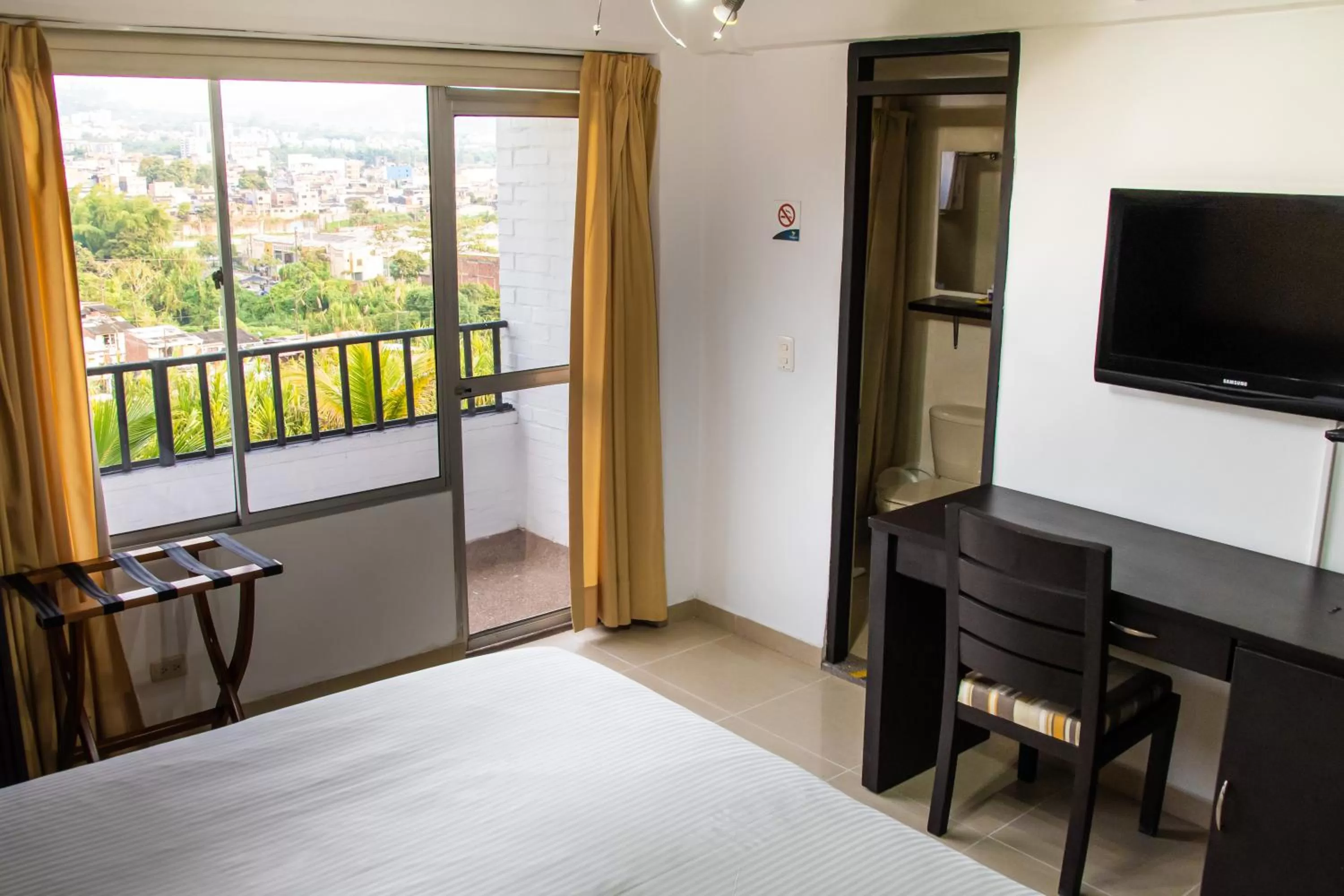 Garden view, Bed in Hotel Tangara