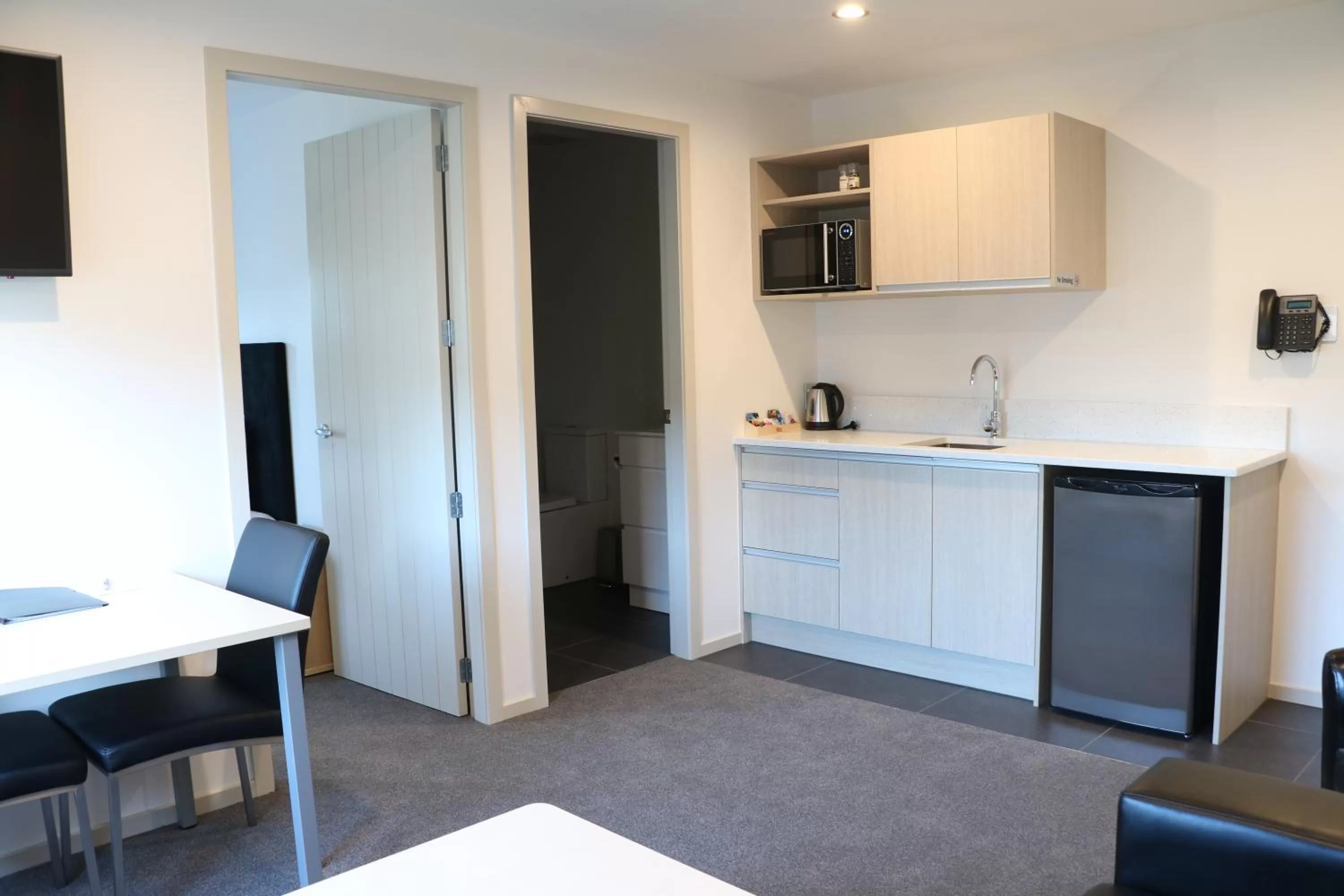 Kitchen or kitchenette in MCM Motel Christchurch