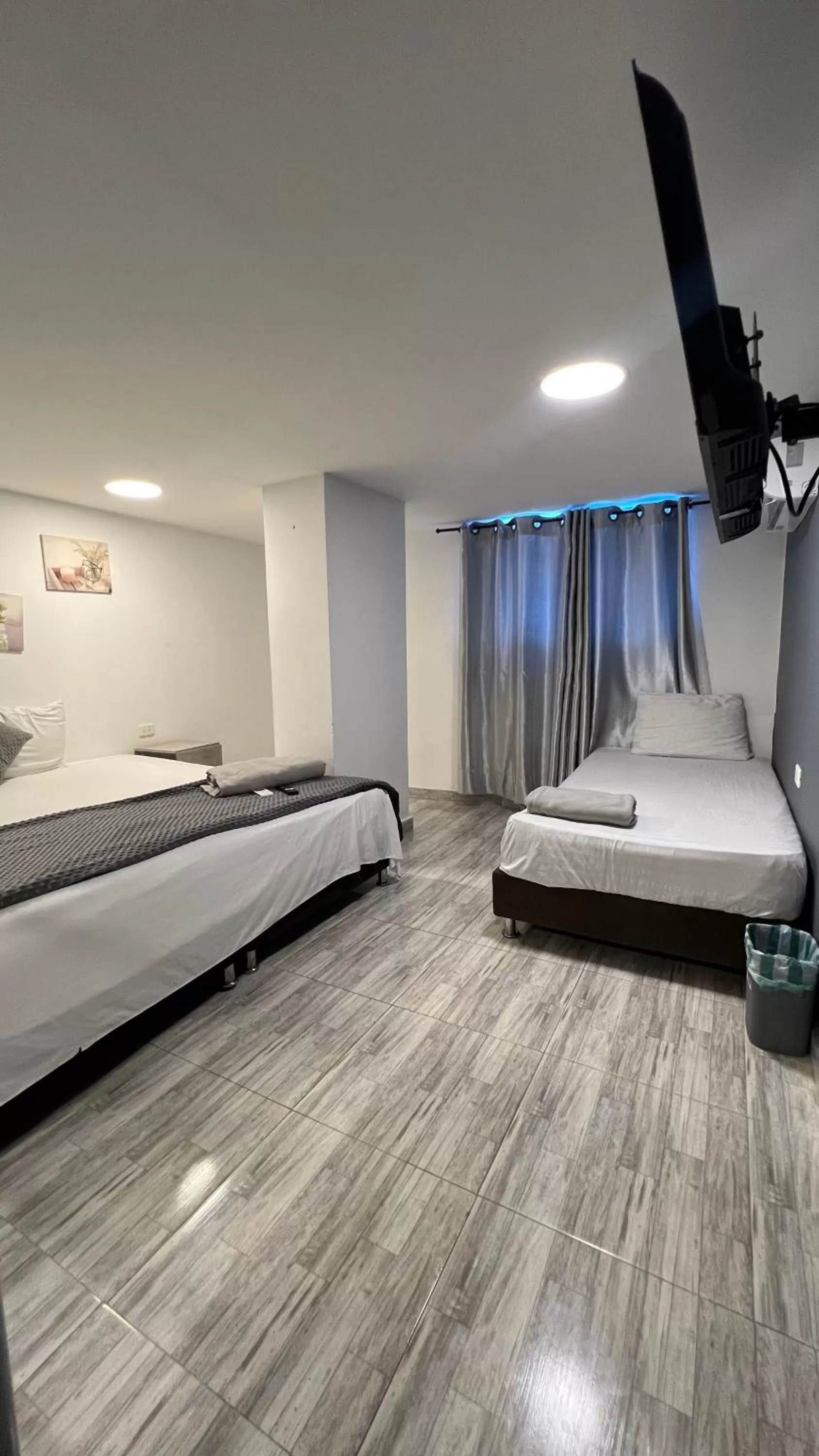 Bed in Bahia 79 Apartasuites Cerca al Centro