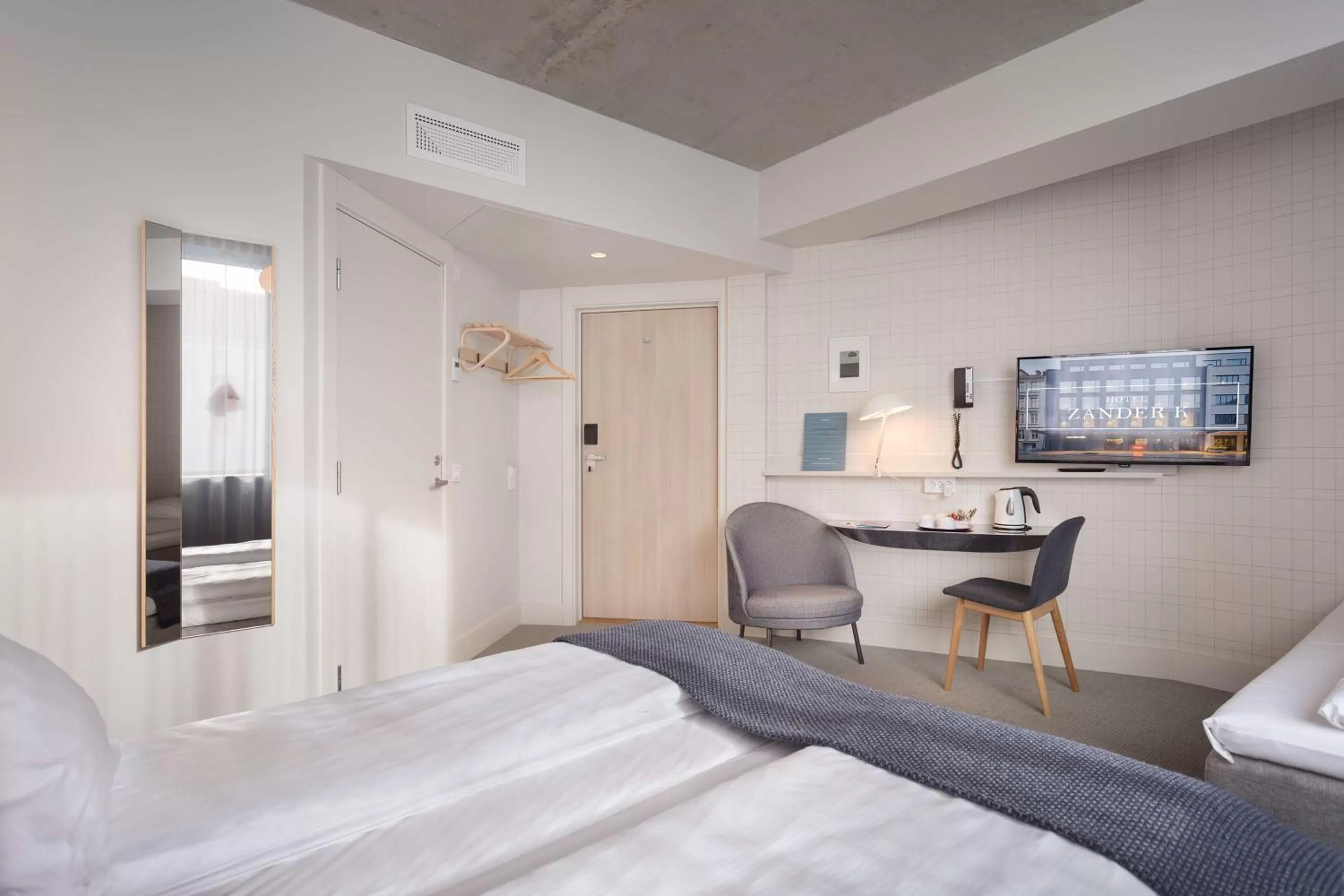 Photo of the whole room, Bed in Zander K Hotel