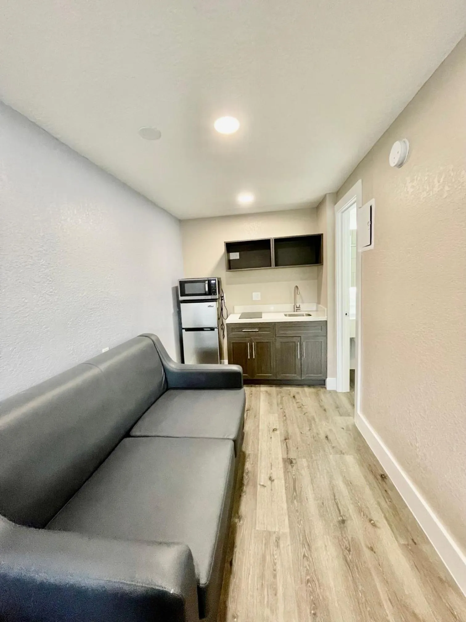 Seating area in Super 8 by Wyndham Kissimmee-Orlando