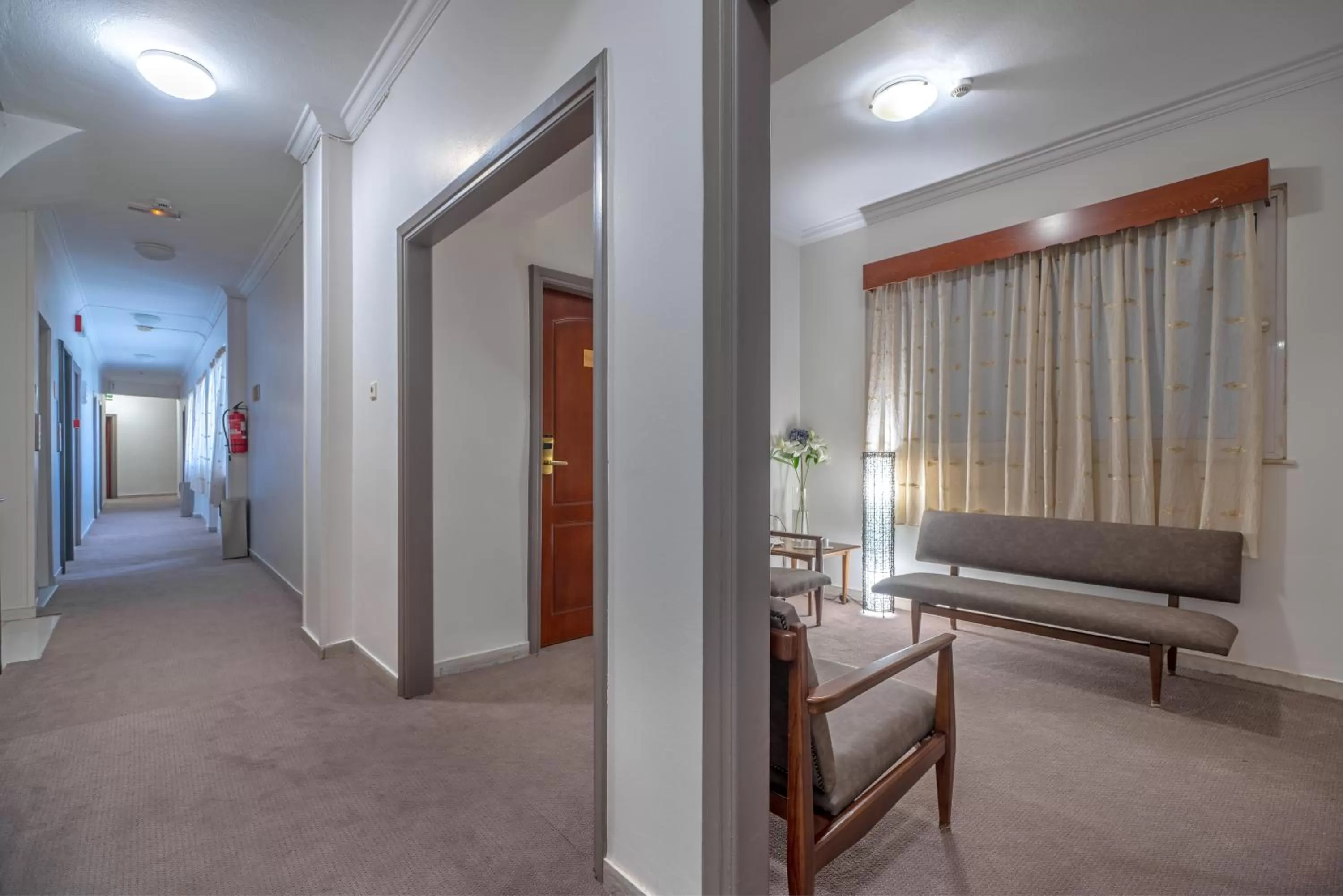 Communal lounge/ TV room in Attalos Hotel