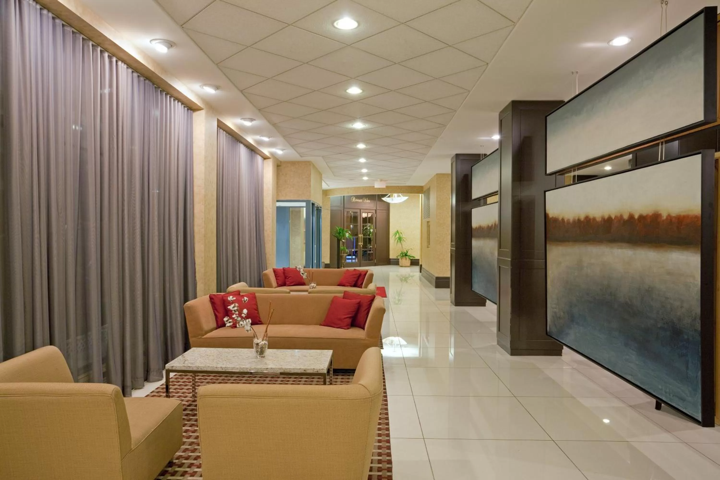 Lobby or reception in Armon Plaza Montreal Airpt, Trademark Collection by Wyndham