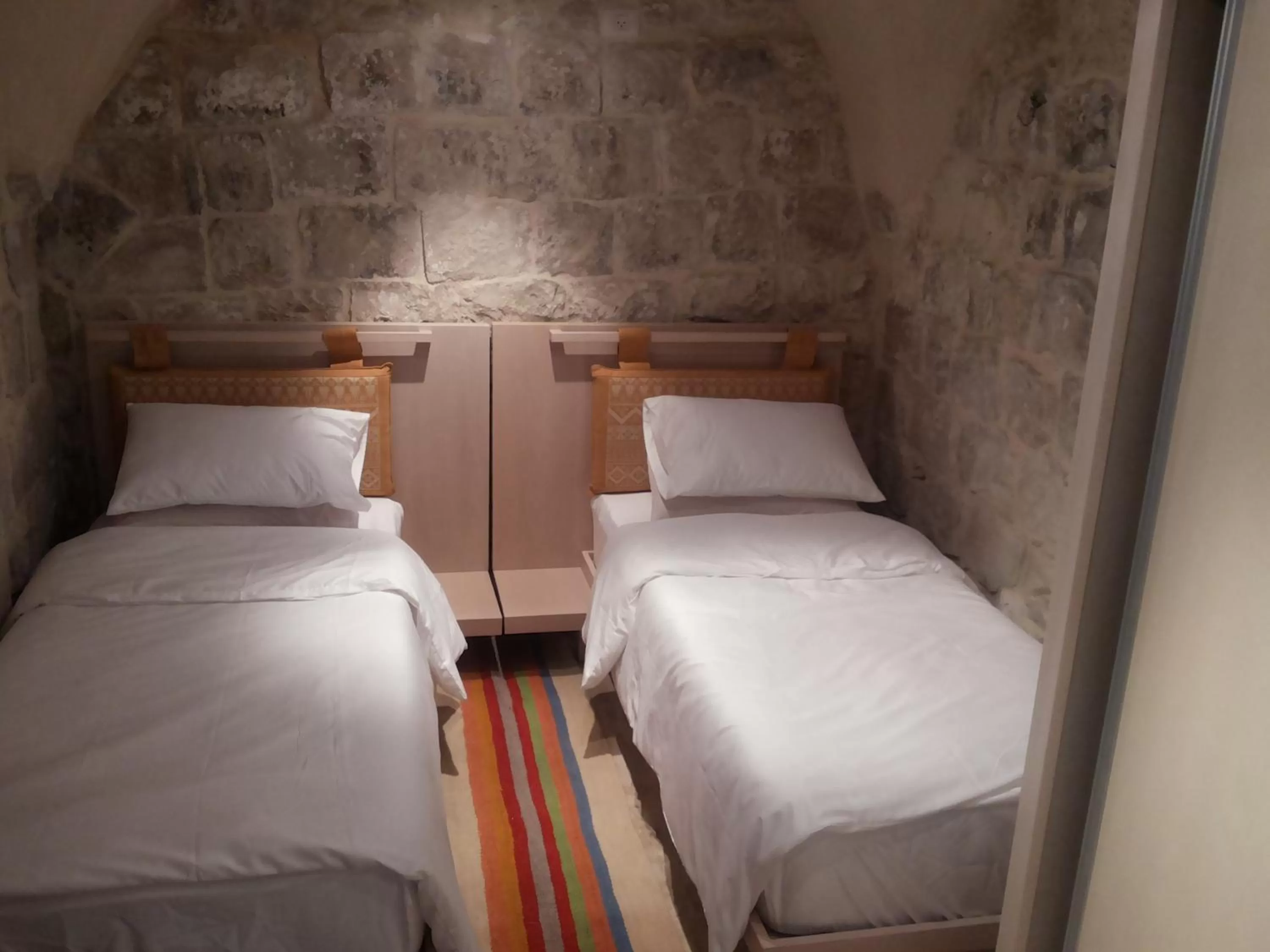 Bed in Khan Alwakala Hotel