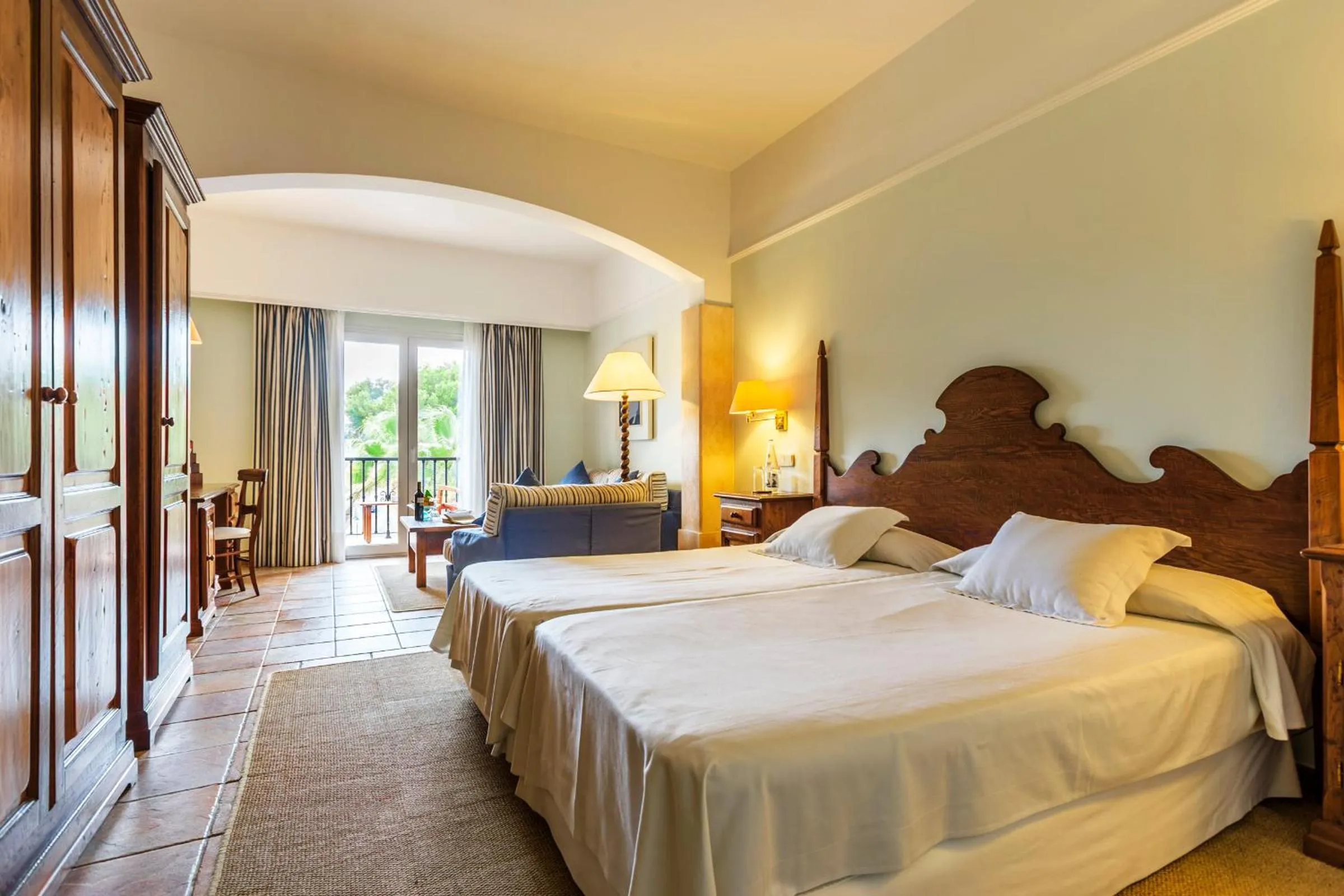 Photo of the whole room, Bed in Hotel Cala Sant Vicenç - Adults Only