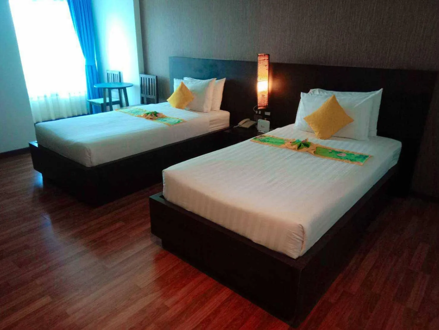 Bed in Jingjit Hotel