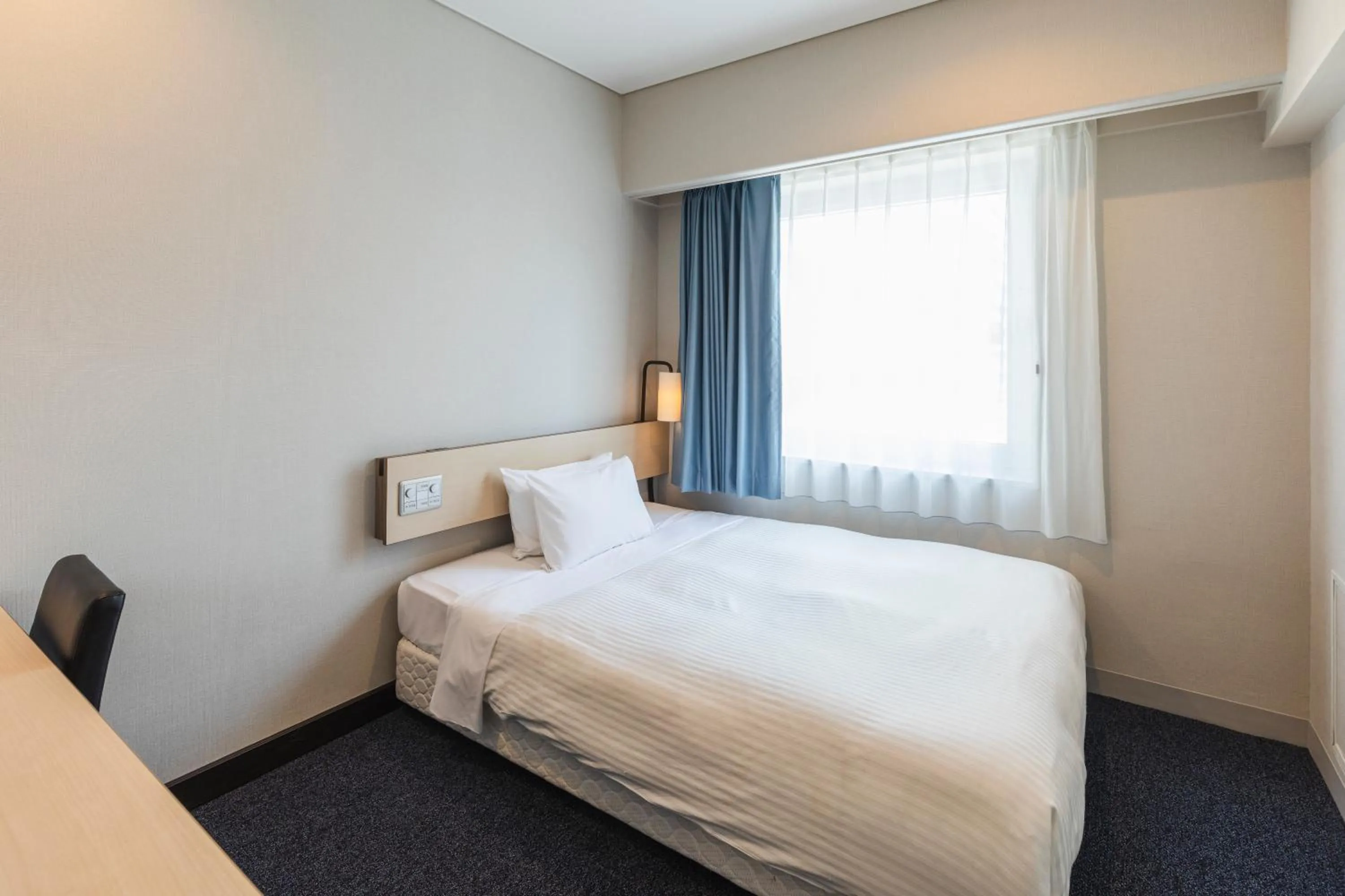 Photo of the whole room, Bed in Sotetsu Fresa Inn Tokyo-Toyocho