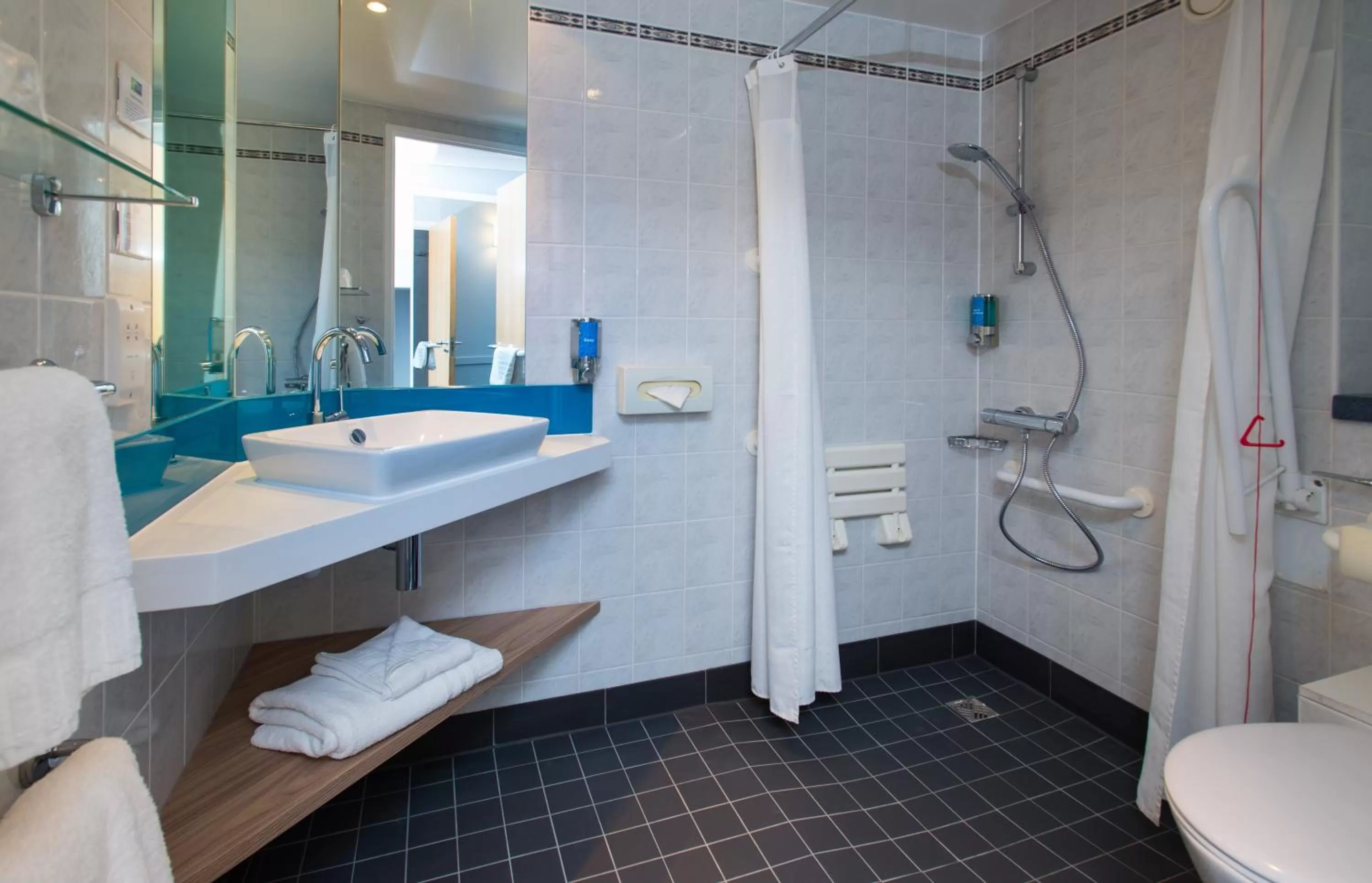 Bathroom in Holiday Inn Express Milton Keynes by IHG