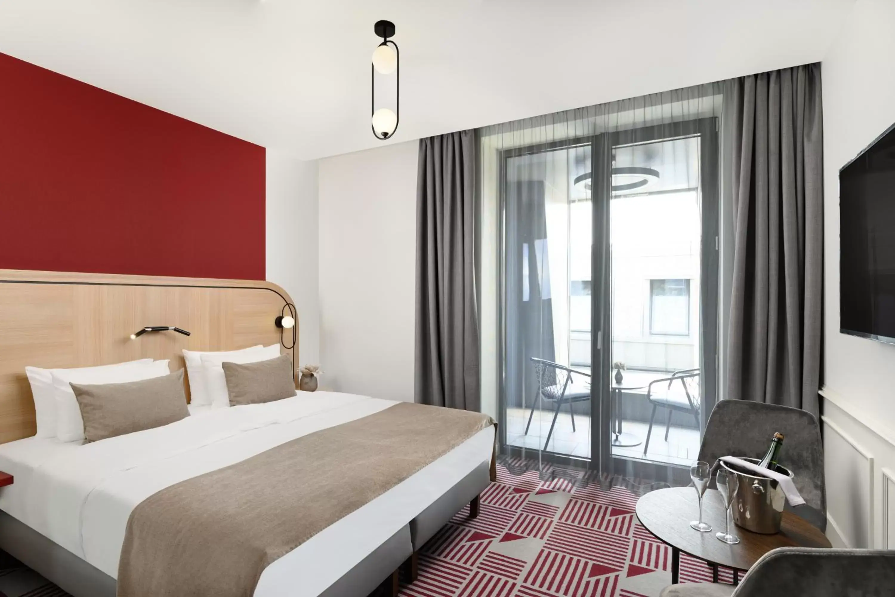 Double Room with Balcony in Hotel Oktogon Haggenmacher by Continental Group Double Room with Balcony in Hotel Oktogon Haggenmacher by Continental Group