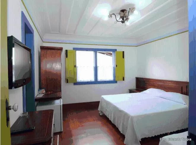 Bedroom in Pousada Laços de Minas