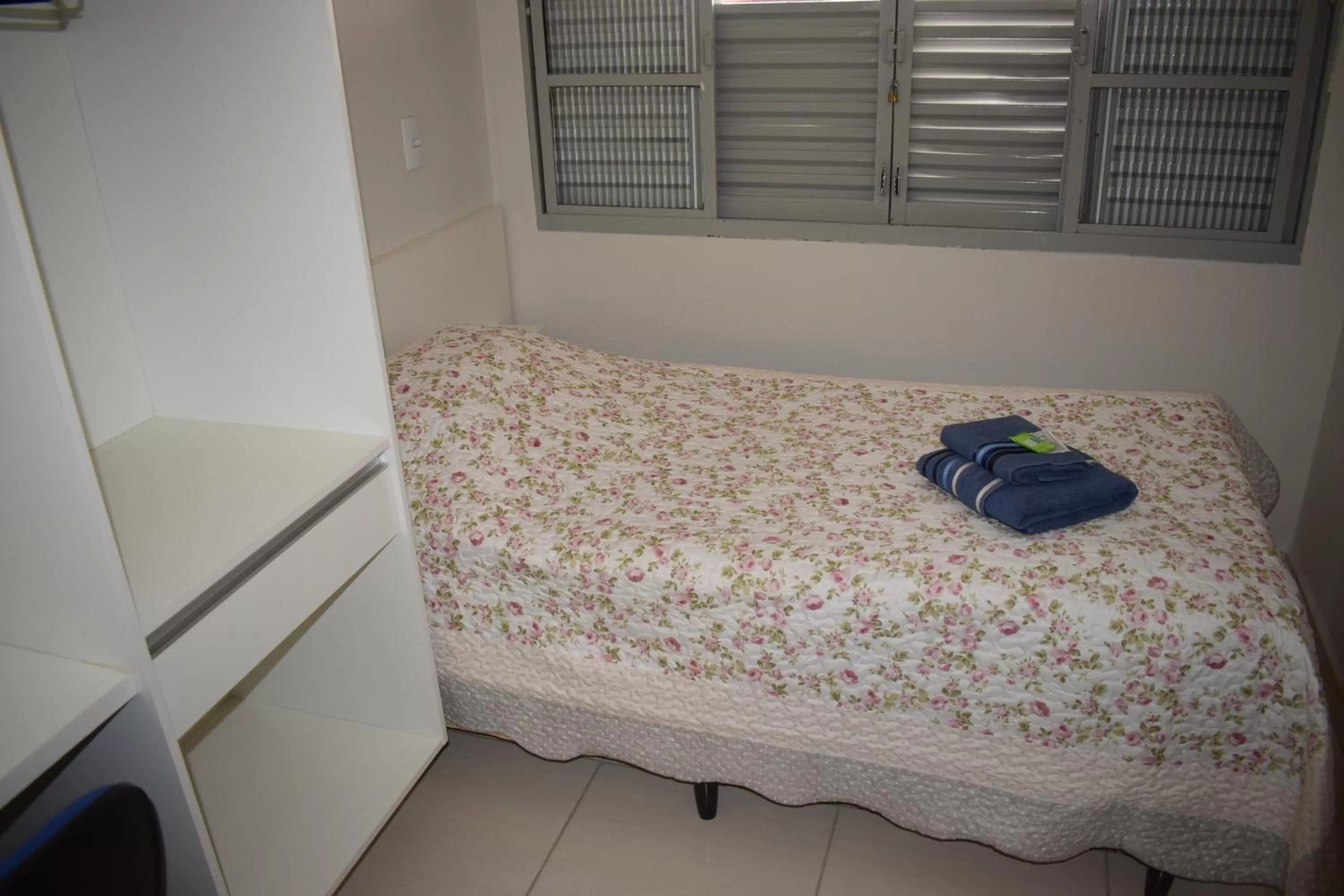 Bed in Pousada Araxá