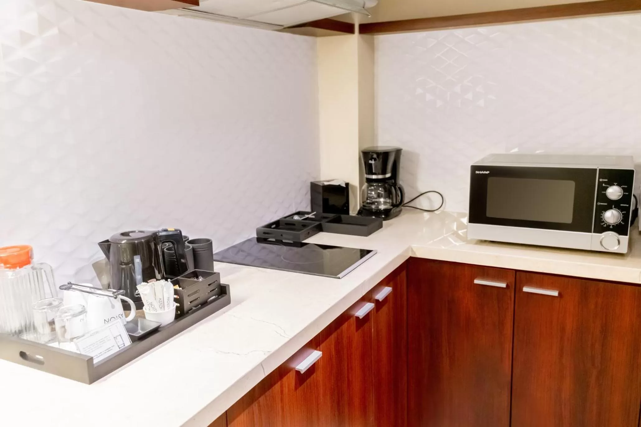 Kitchen or kitchenette in Aston Denpasar Hotel & Convention