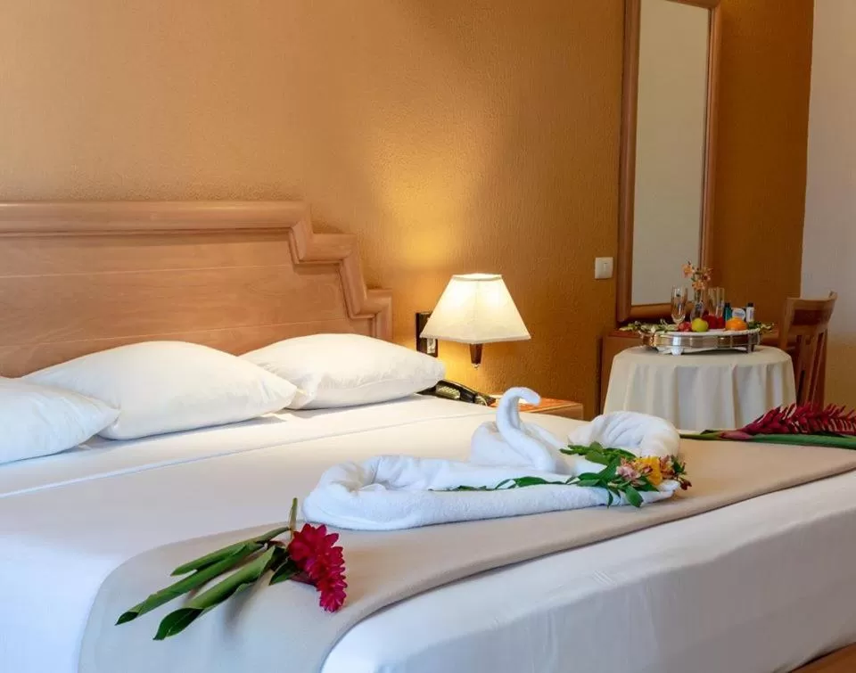 Bed in Tecnohotel Itzáes