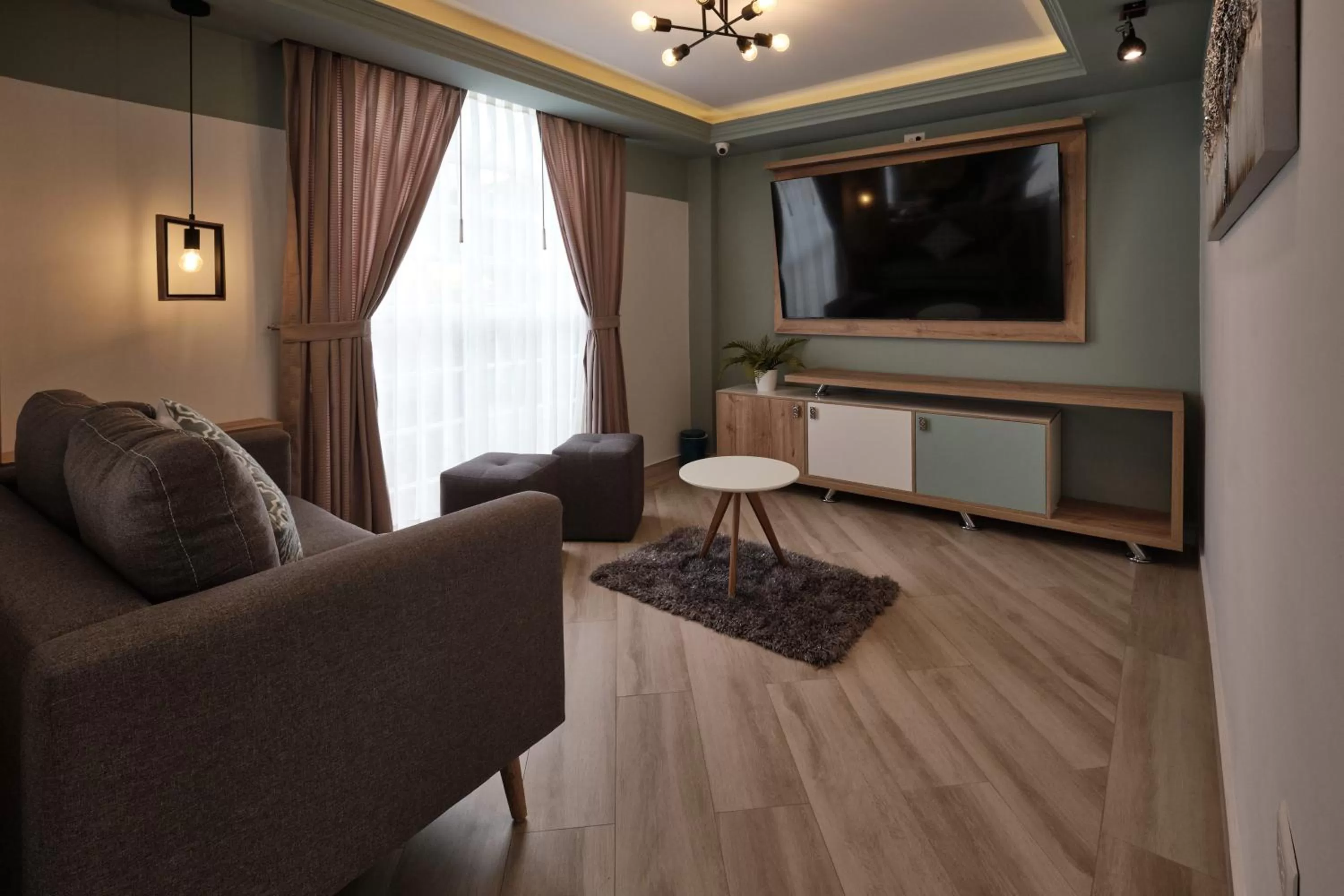 Communal lounge/ TV room, Seating Area in Asher Hospedaje y Turismo