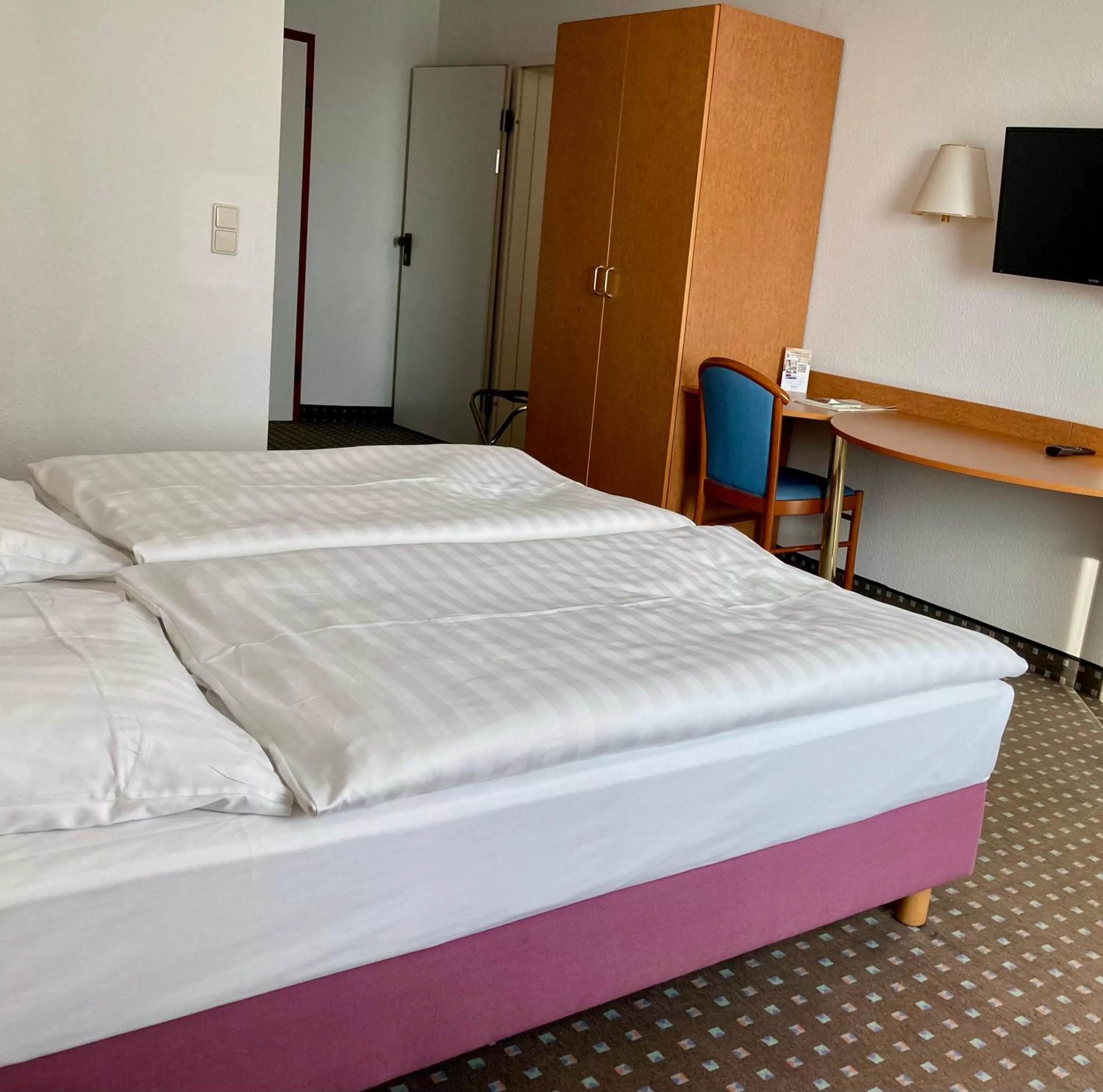 Bed in Akzent Congresshotel Hoyerswerda