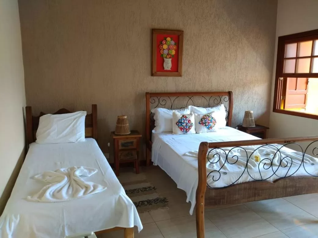 Bed in Pousada Solar da Serra