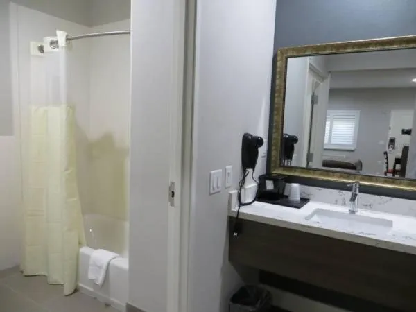 Bathroom in Grand Villa Inn and Suites Westchase/Chinatown