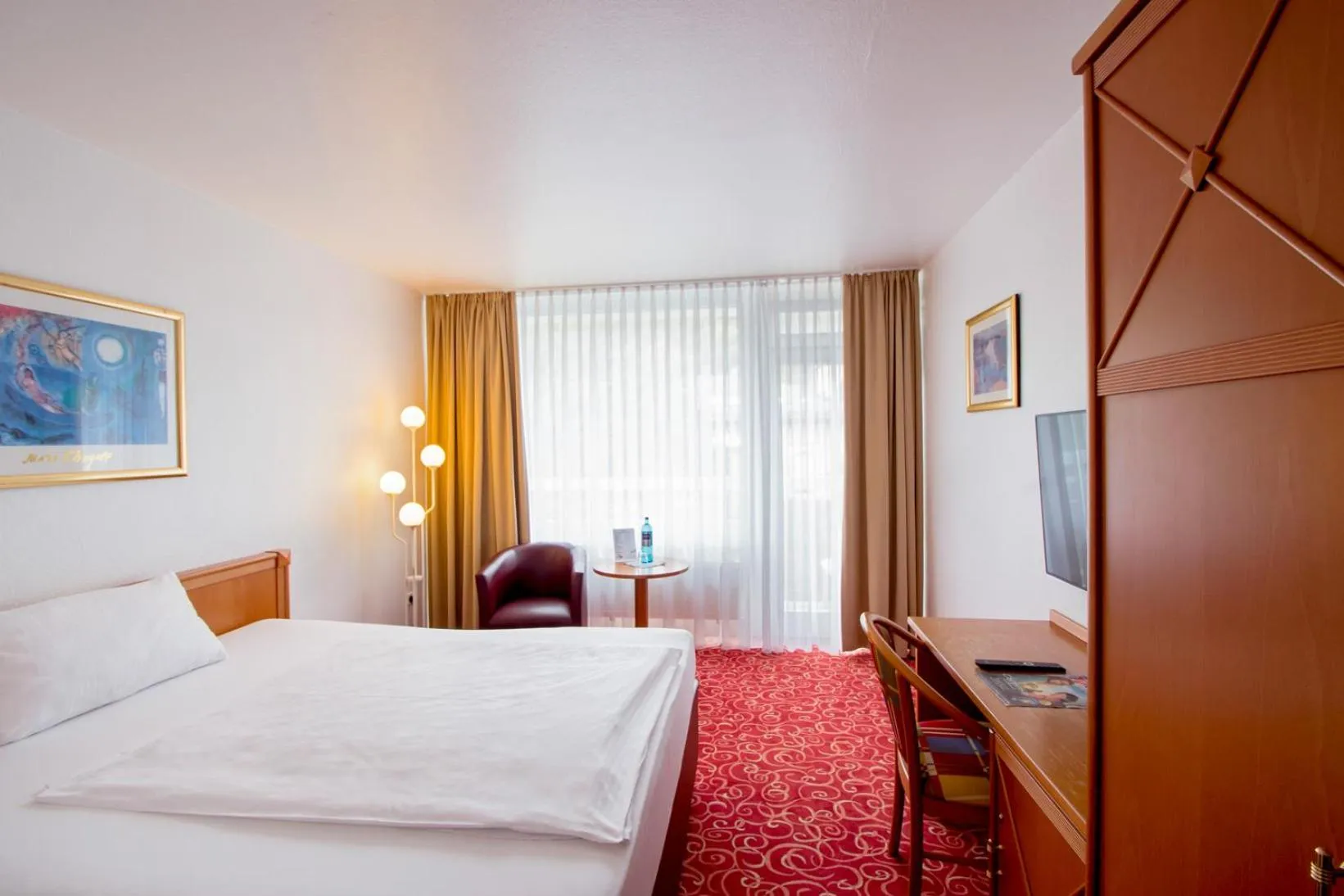 Bed in Caravelle Hotel im Park