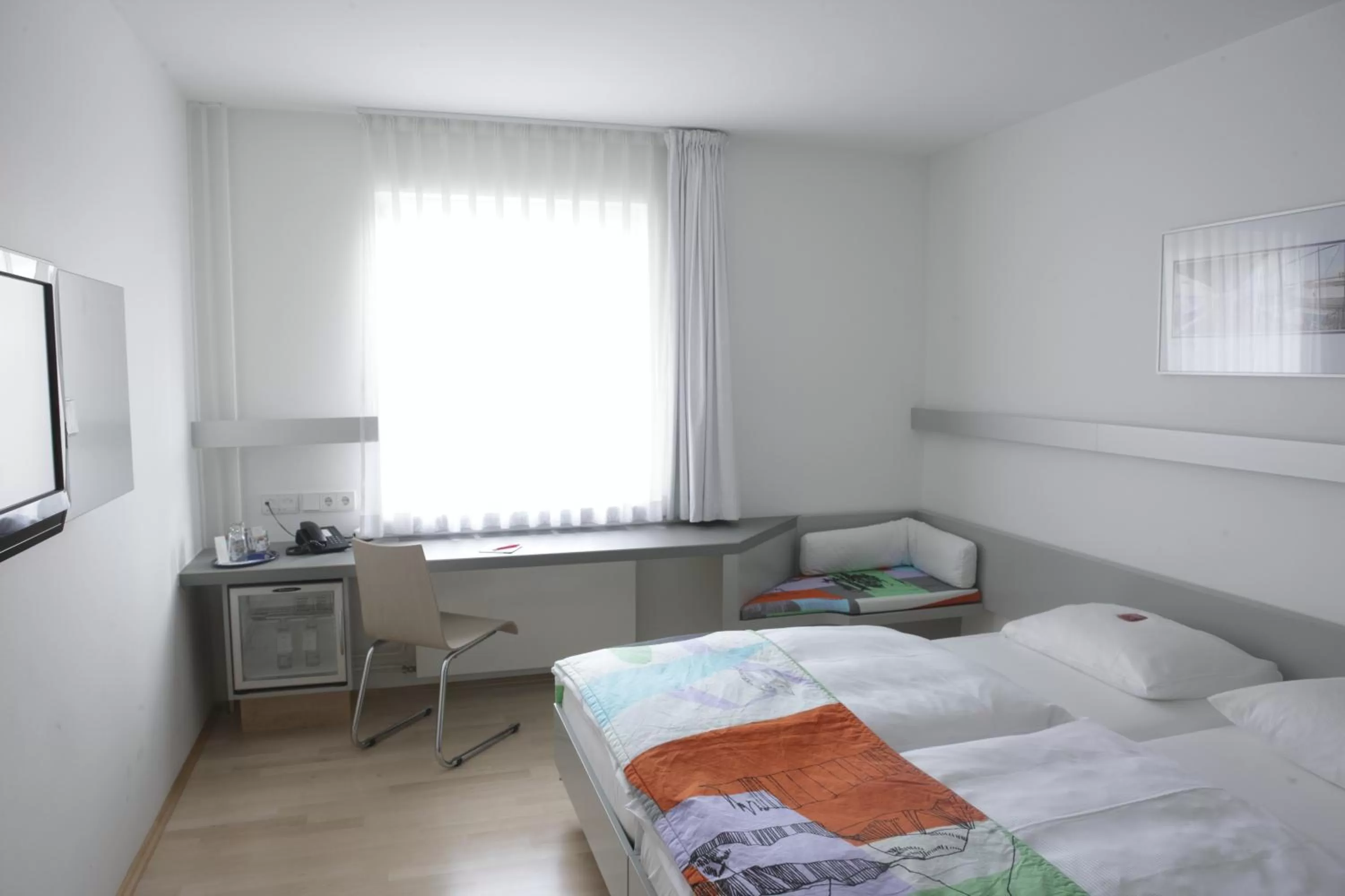 Photo of the whole room, Bed in Hotel Berliner Hof by Coffee Fellows Hotels