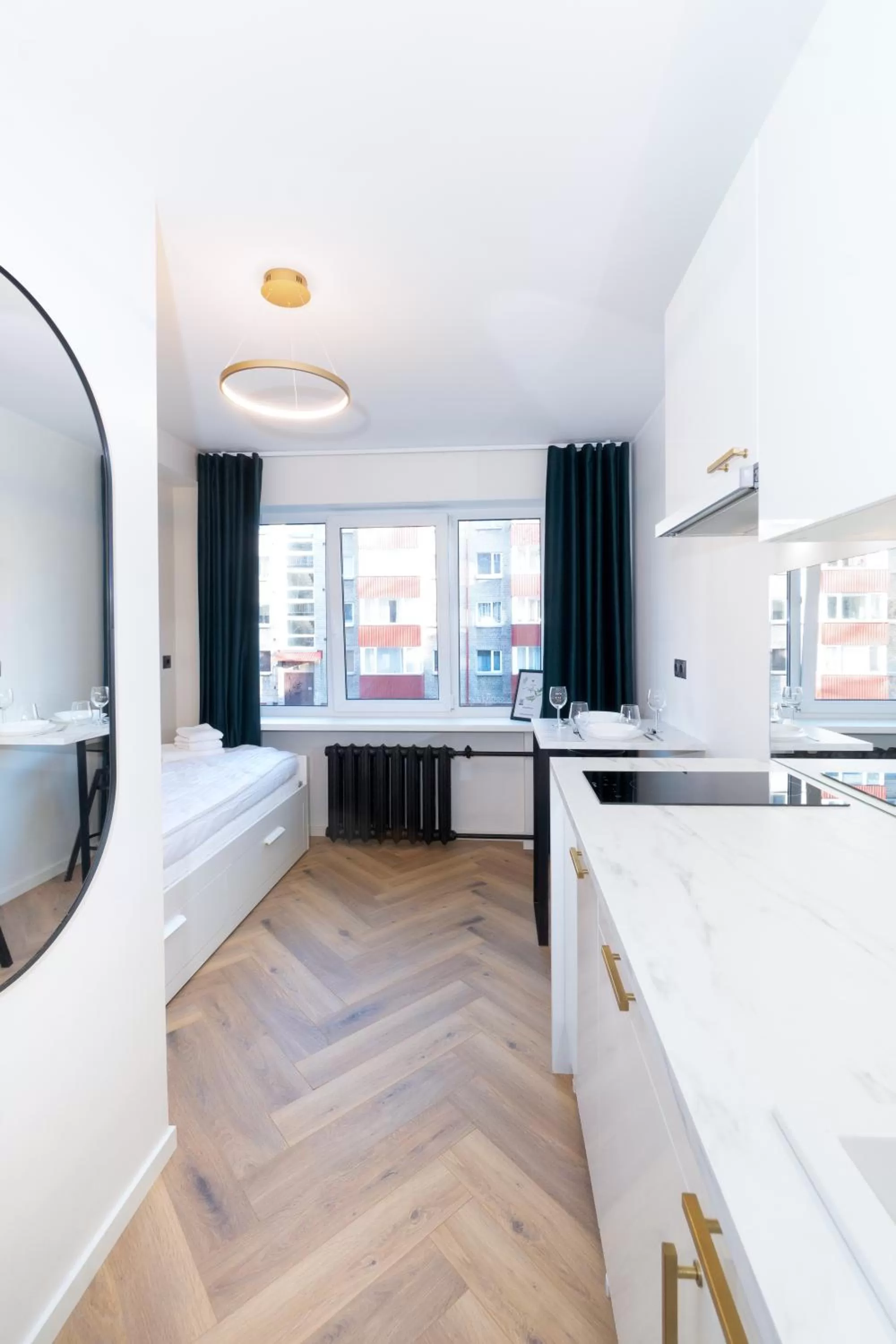 Kitchen or kitchenette, Bed in Tallinn Airport Studios by Revalhome