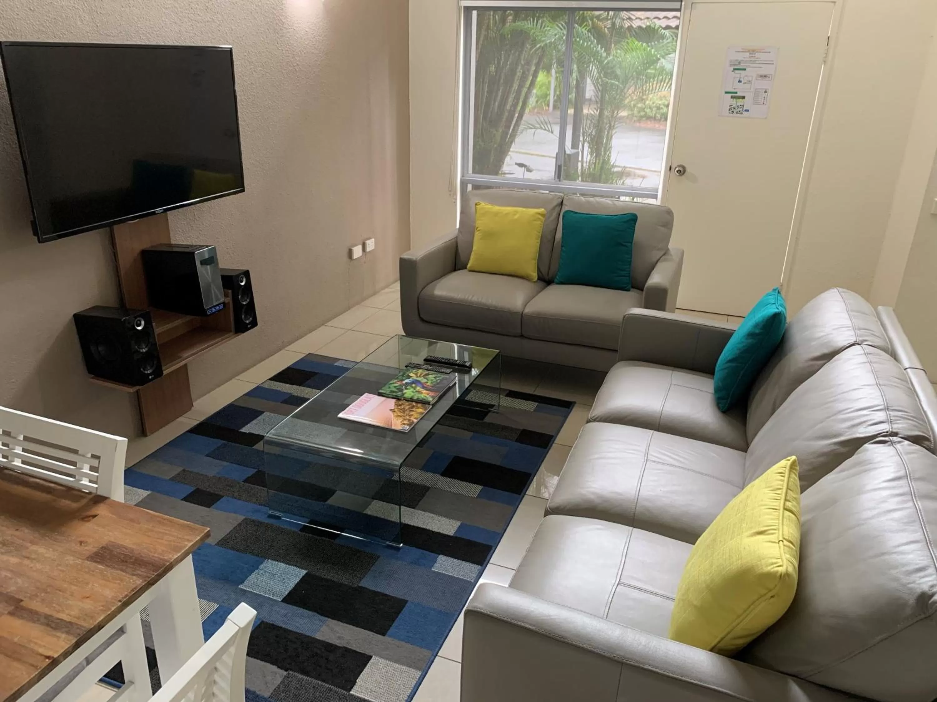 Communal lounge/ TV room in Reef Resort Villas Port Douglas