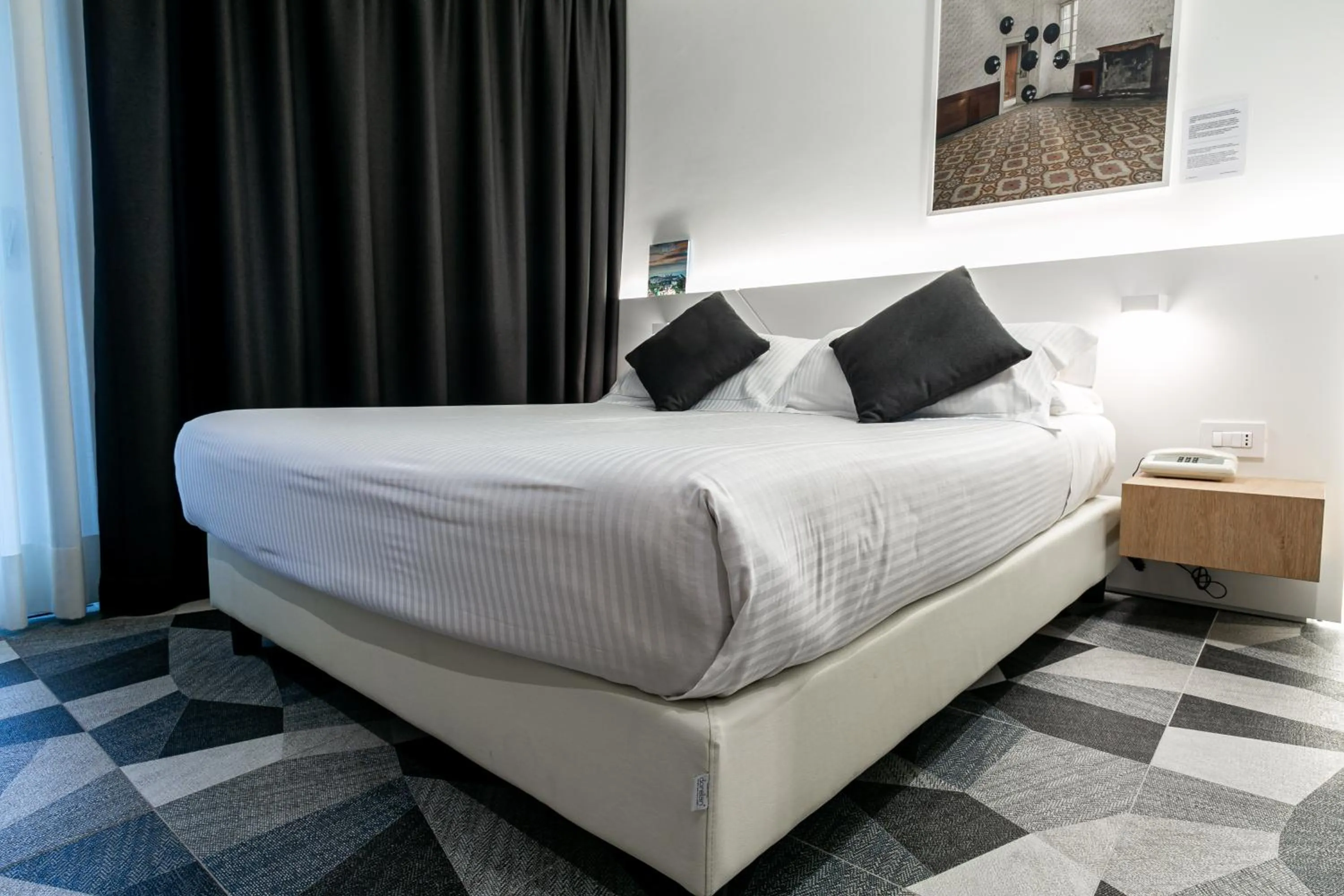 Bed in Hotel Cappello D'Oro, BW Signature Collection