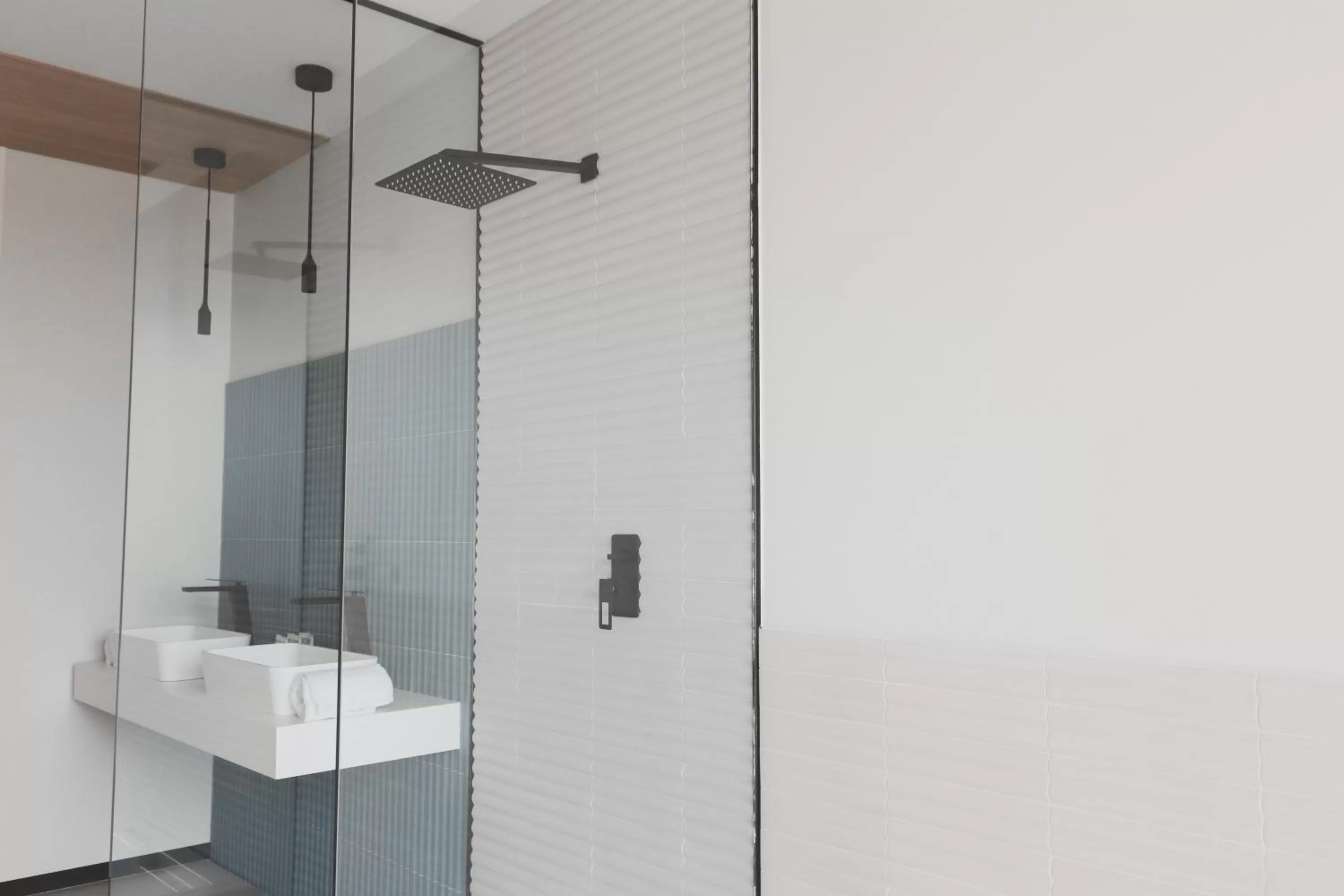 Shower, Bathroom in Atmos Hotel Boutique