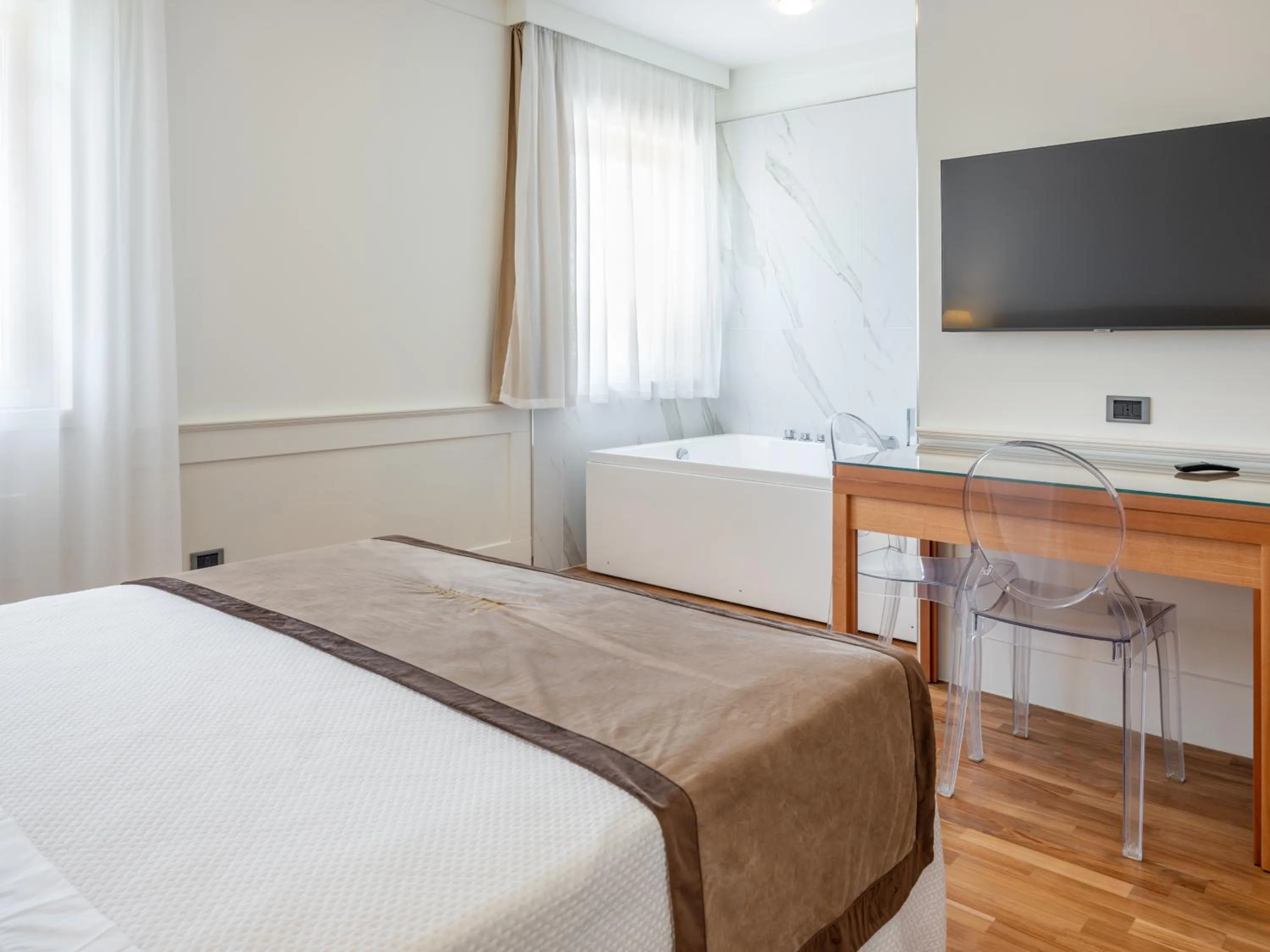 Bedroom, Bed in Mirabella Hotel