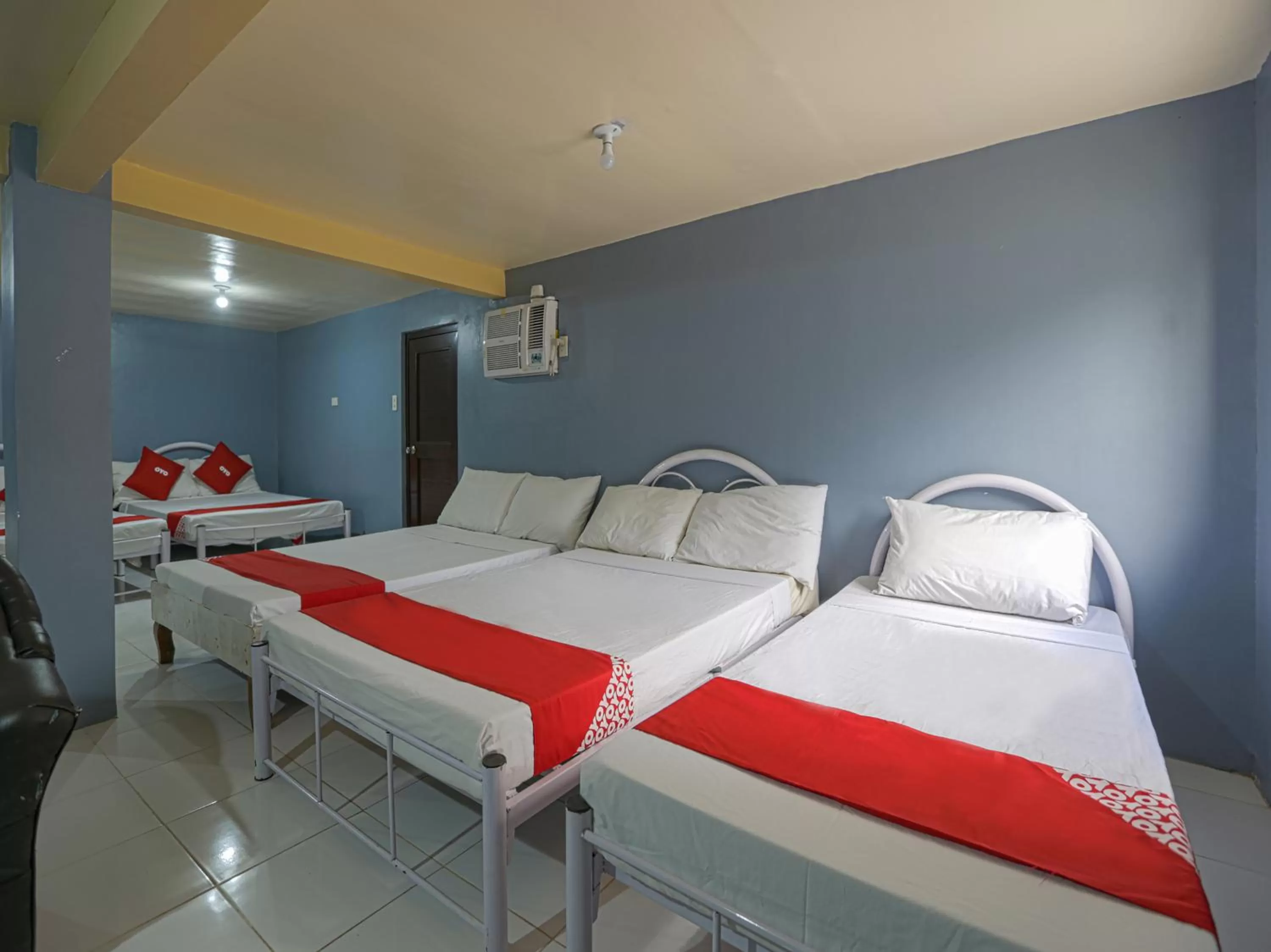 Bedroom, Bed in OYO 784 Laura's Garden Resort