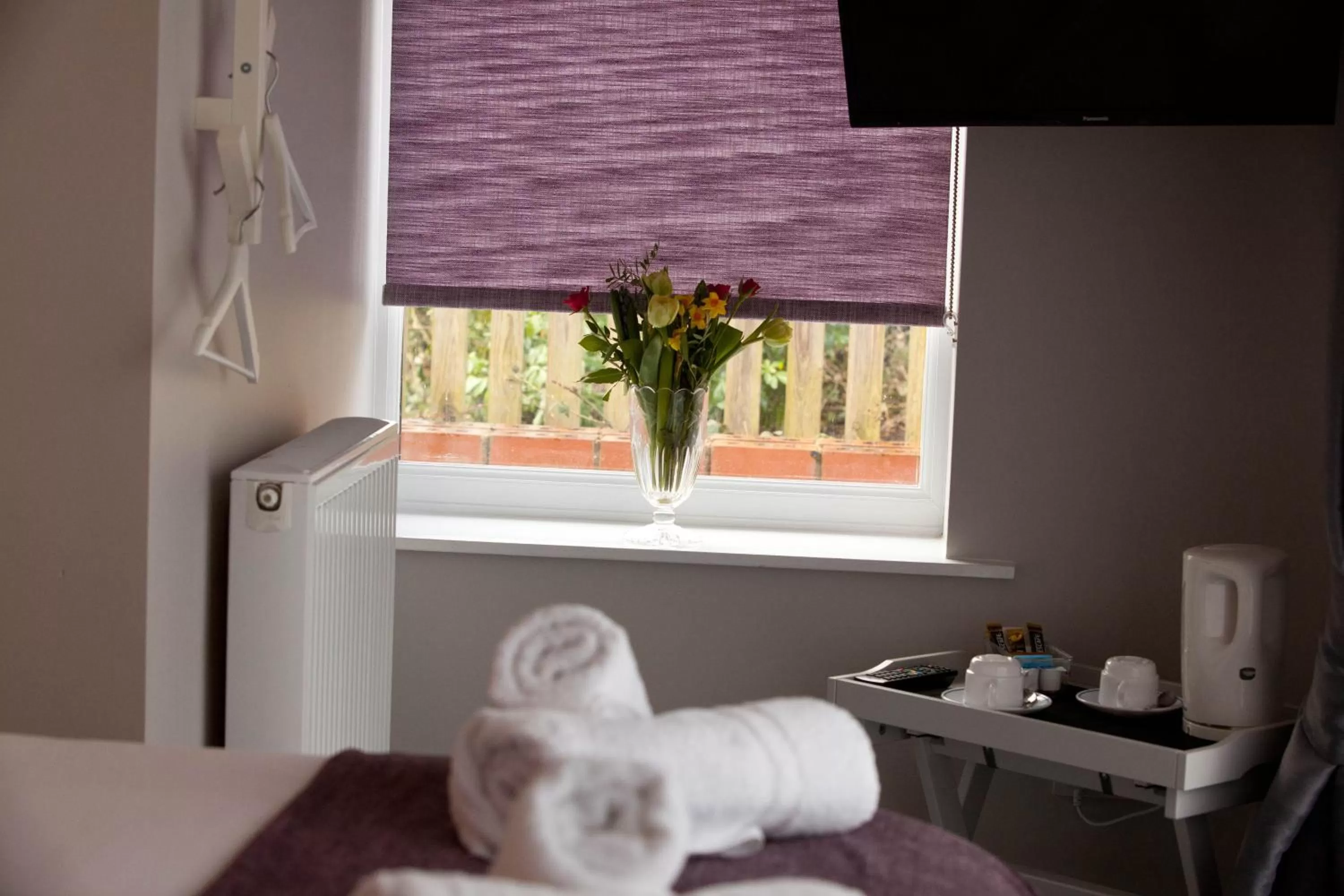 towels, Bed in Rowton Poplars Hotel