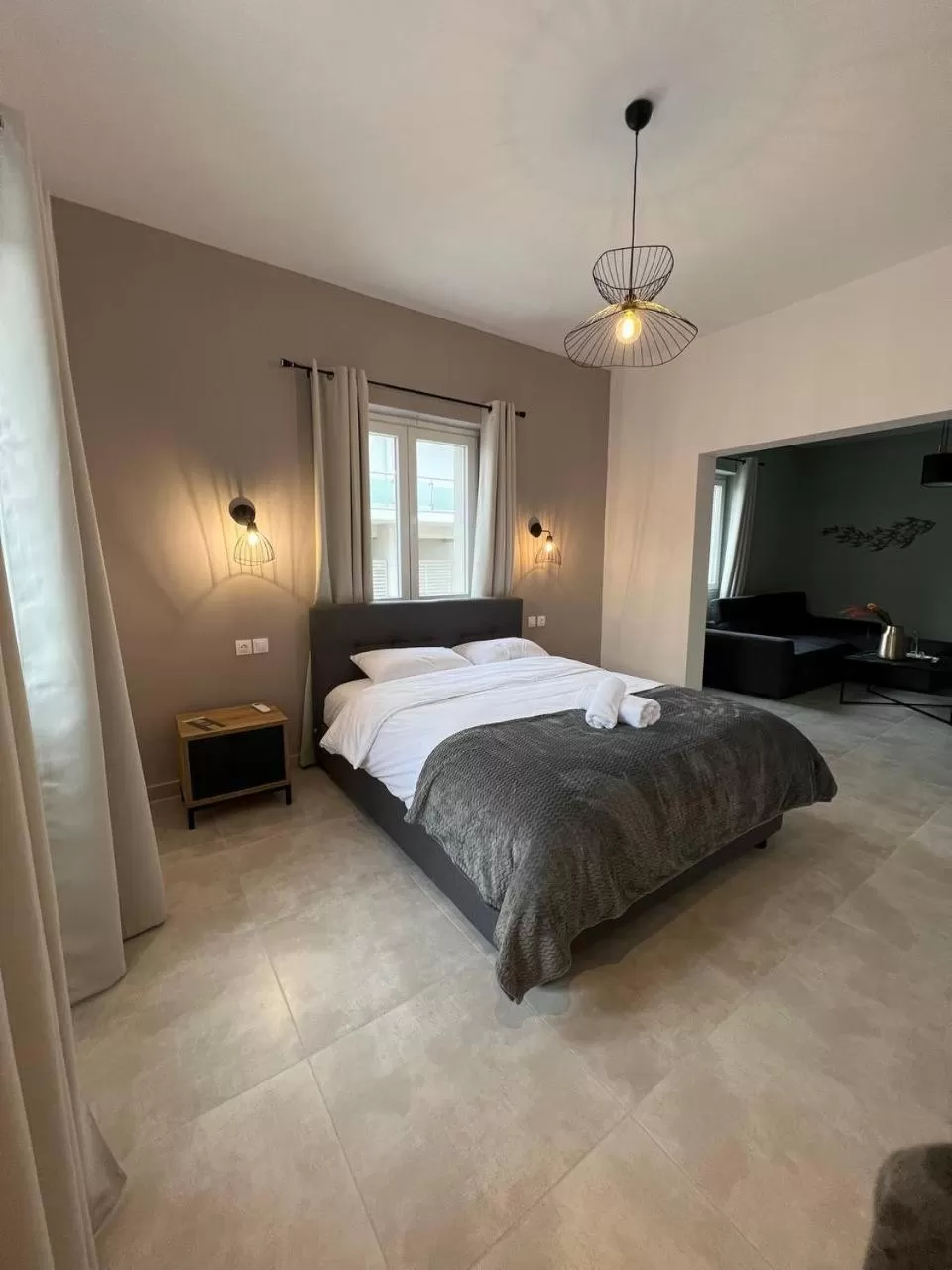 Bed in Elefsinian Mysteries Apartments