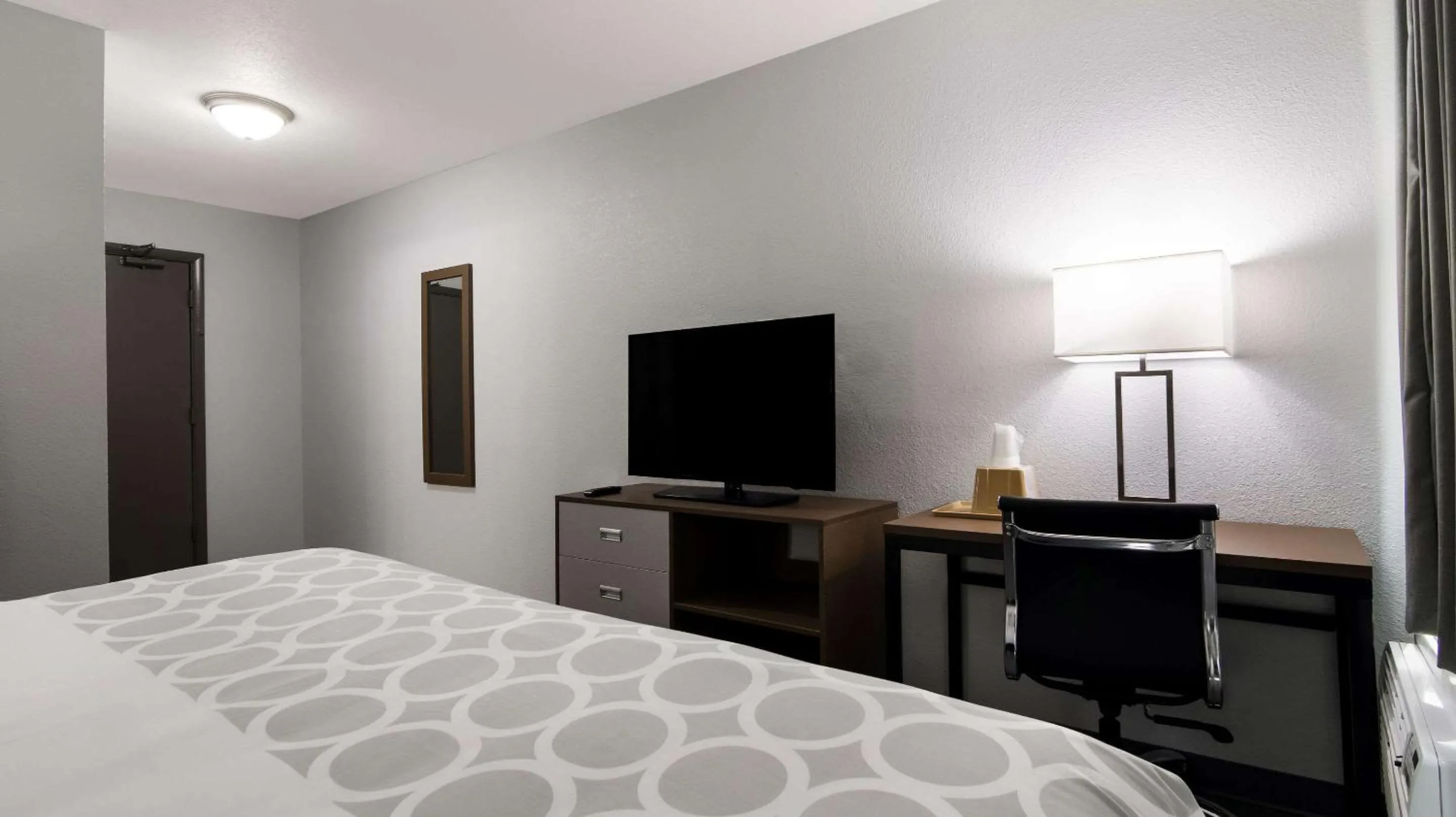 Bedroom in Suburban Studios Portage