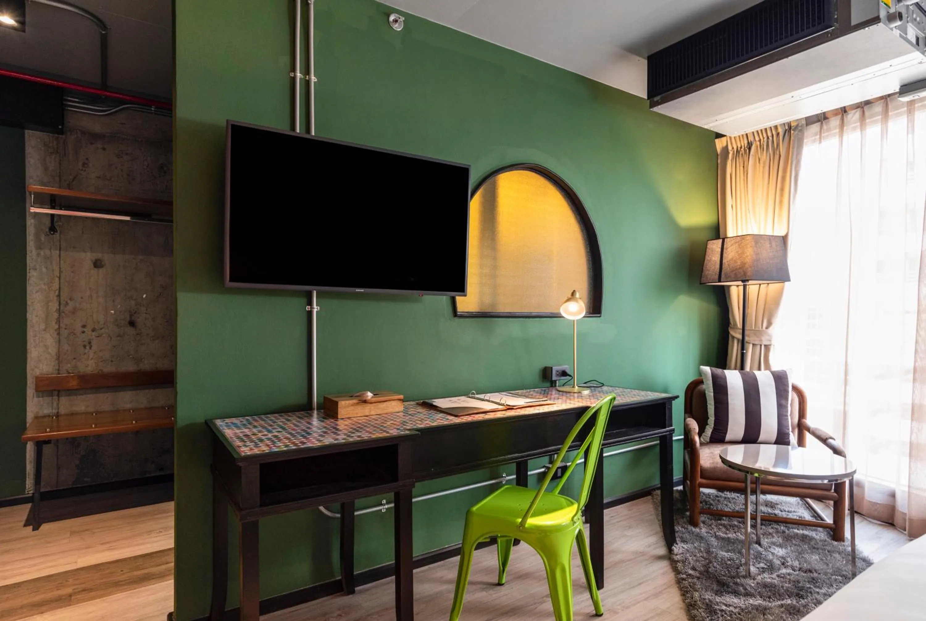 Communal lounge/ TV room in MeStyle Museum Hotel