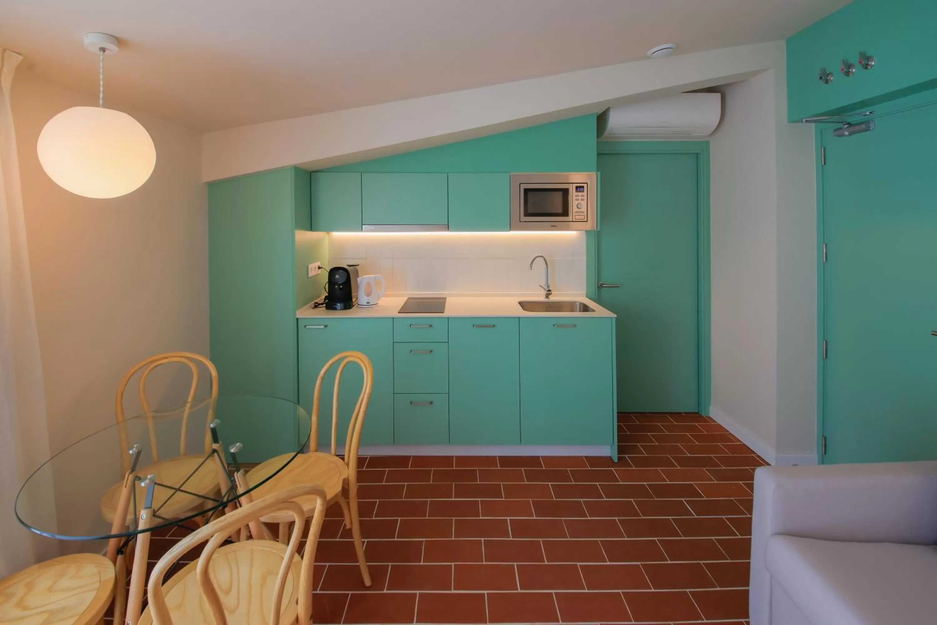 Kitchen or kitchenette in Terra Aurea Aparthotel